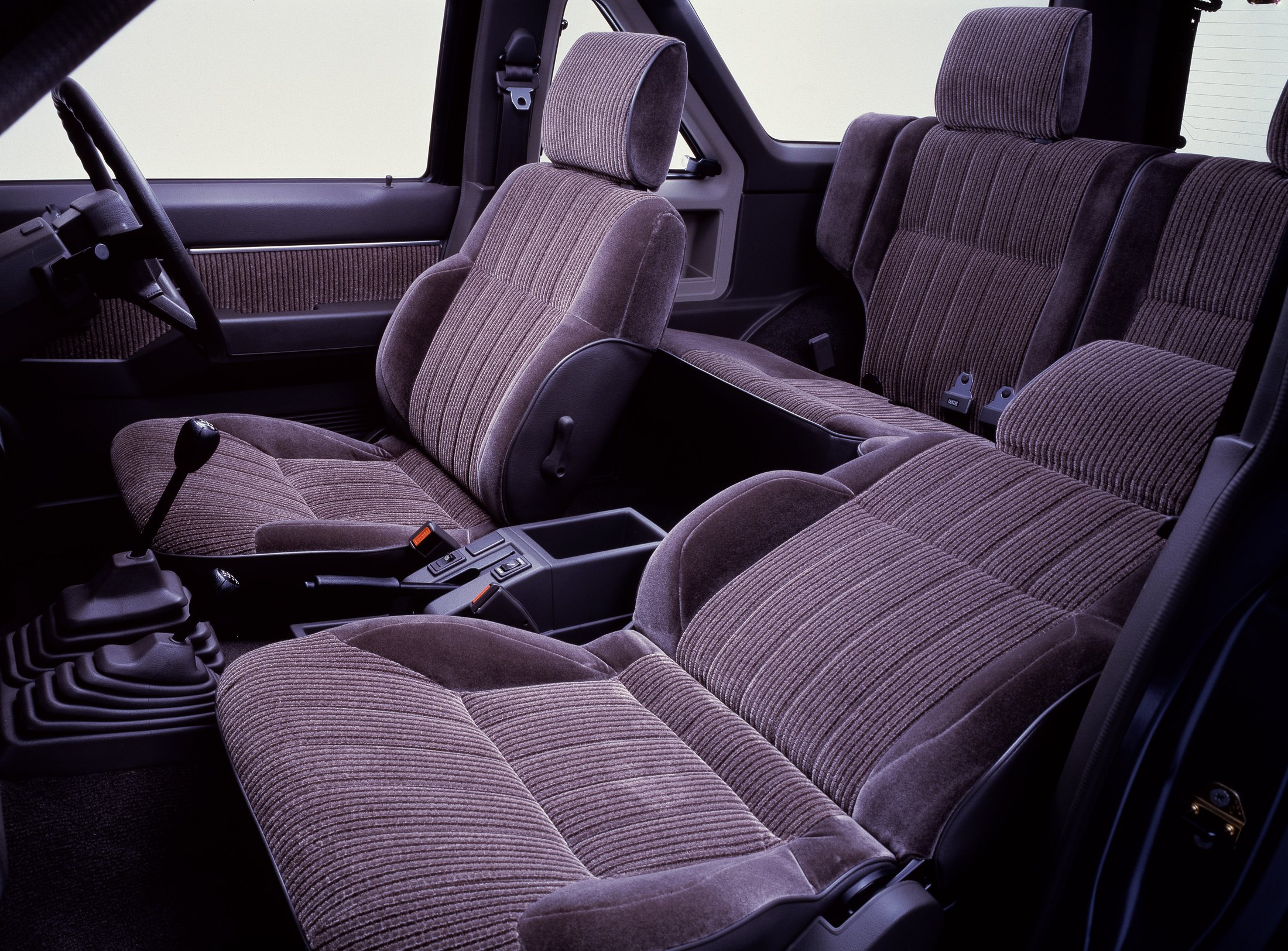 Official Nissan press photo of the 1986 Terrano R3M two-door cabin with corduroy seats