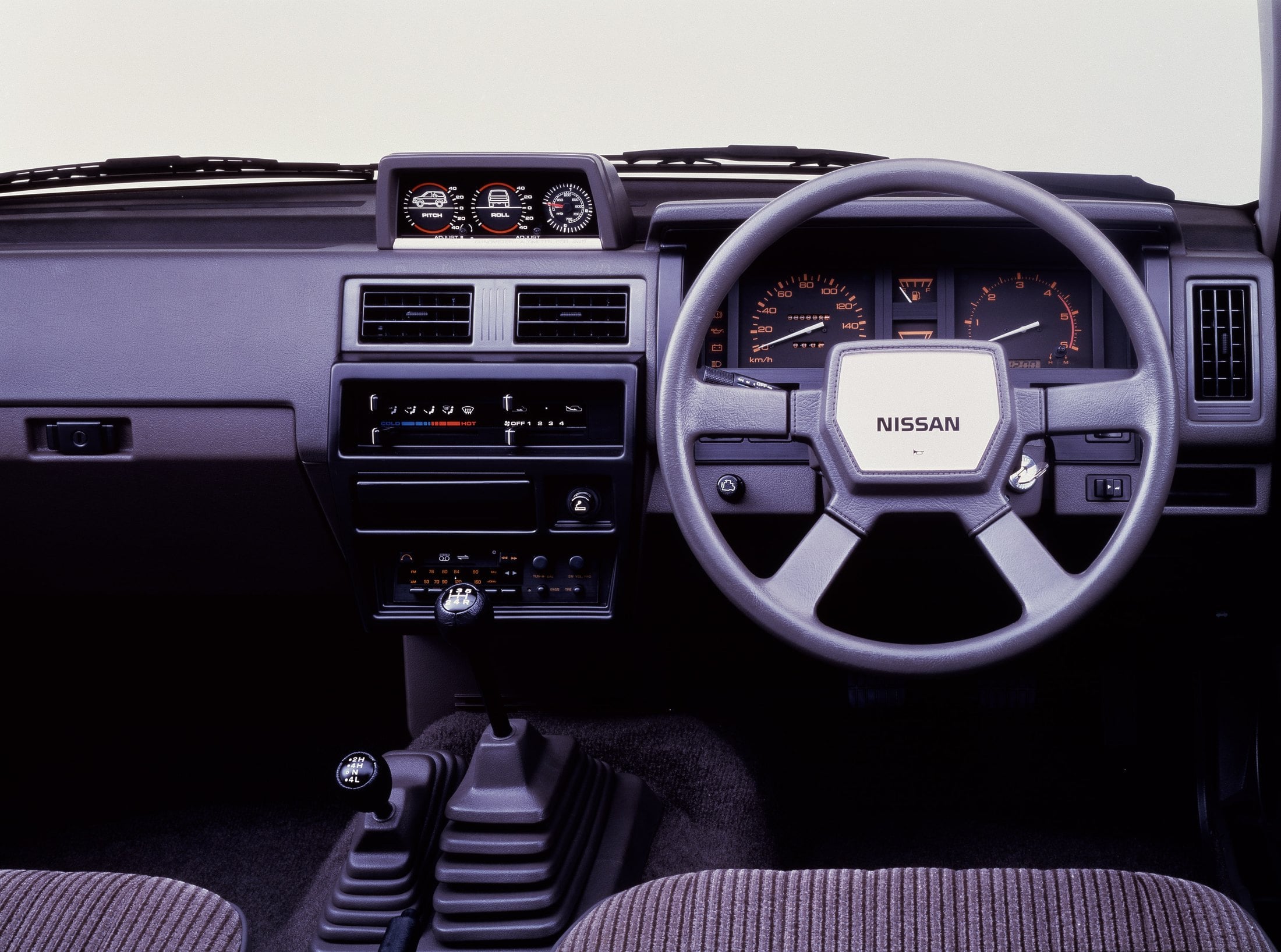 Official Nissan press photo of the 1986 Terrano R3M dashboard with inclinometer pod, five-speed and transfer