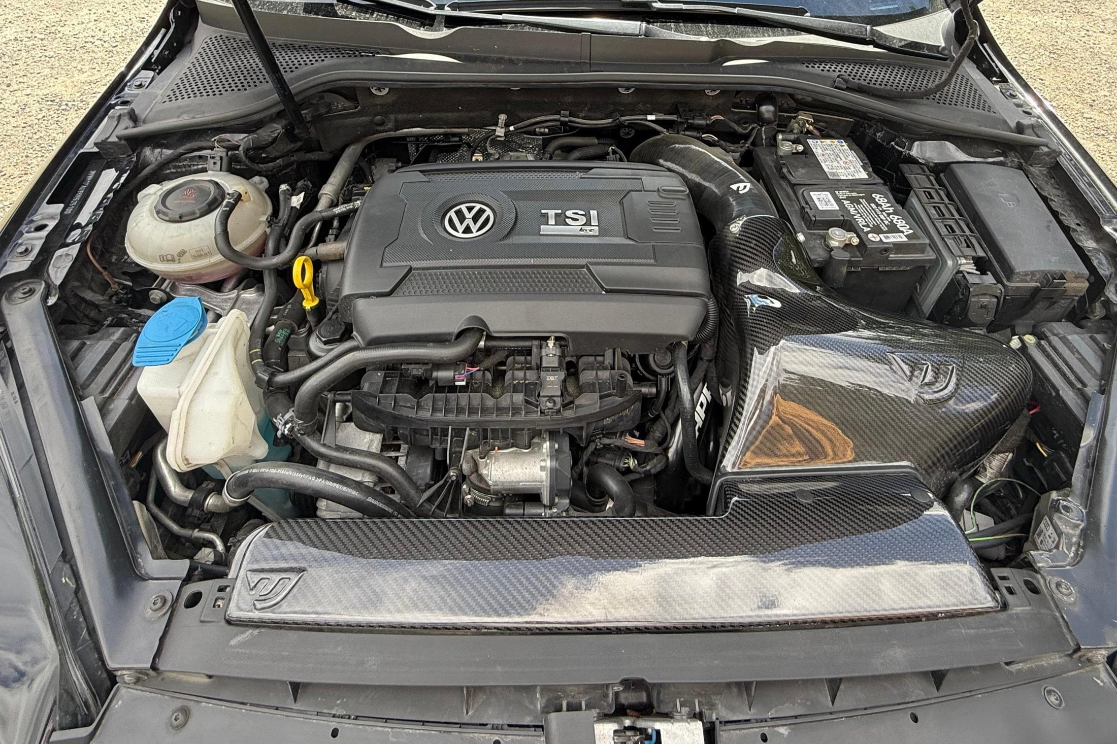 Engine bay of the Alltrack R-wagon with the swapped EA888 2.0T and Unitronic carbon fiber intake