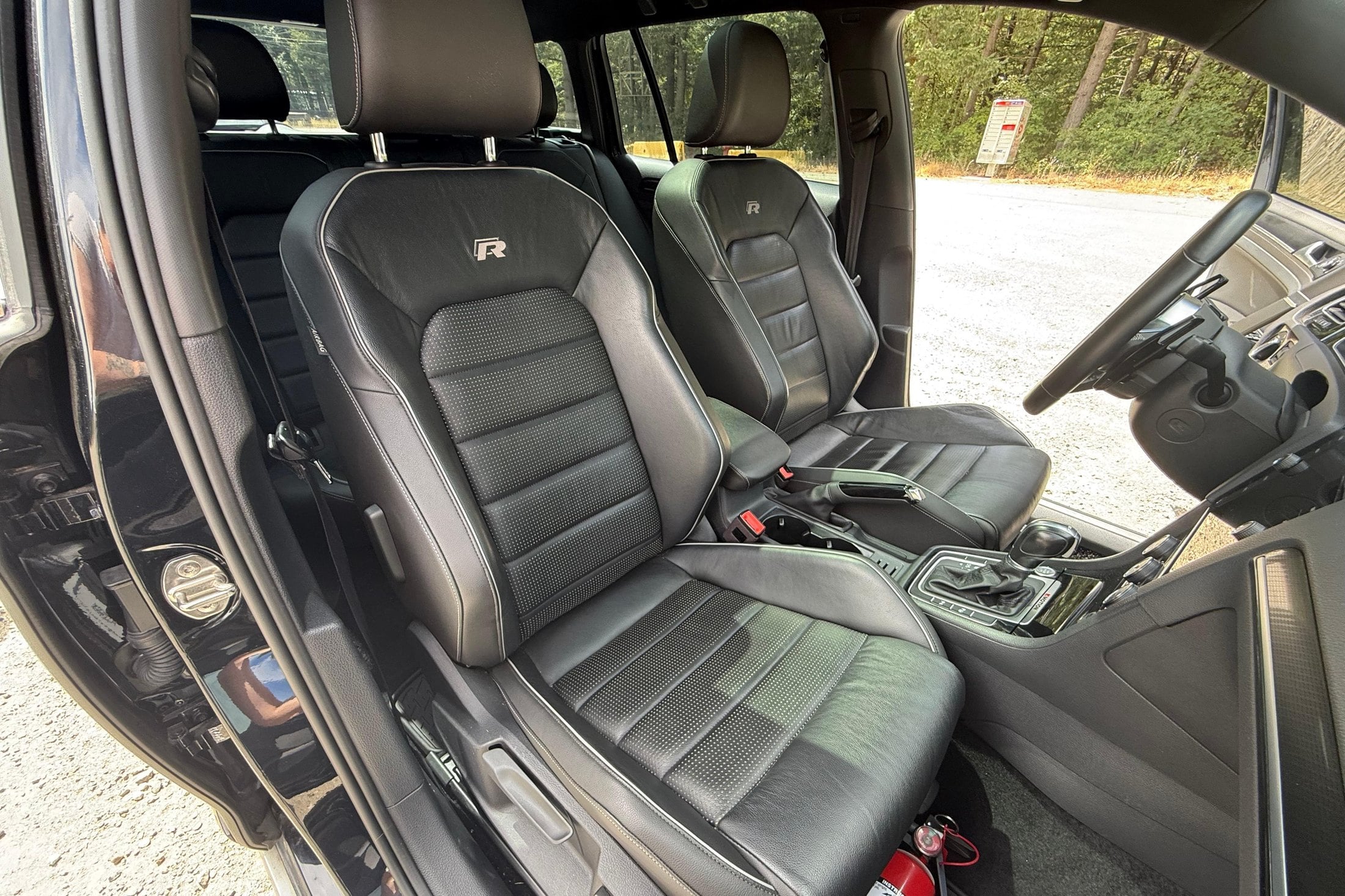 Golf R leather sport seats with R embroidery inside the 2019 Alltrack wagon, DSG shifter and 4Motion badge visible