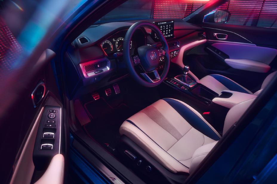 Official Acura photo of the 2026 Integra A-Spec cabin with a six-speed manual shifter and three pedals
