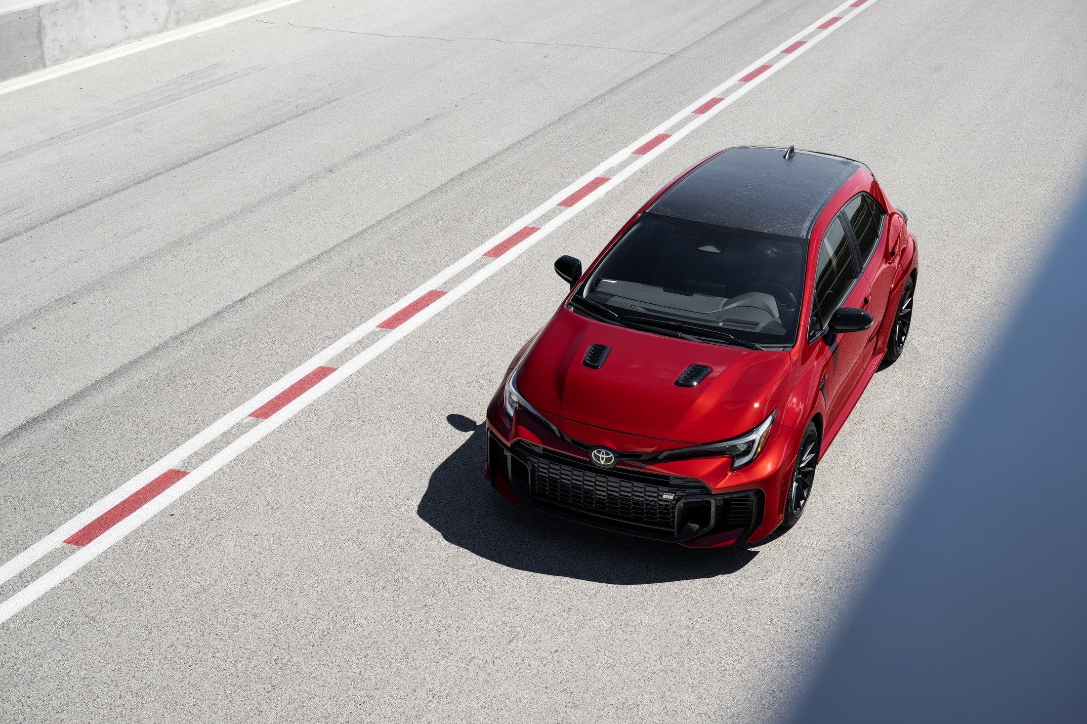 2026 Toyota GR Corolla Premium Plus Supersonic Red on track