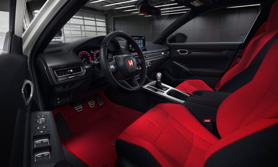 Official Honda photo of the Civic Type R cabin with a six-speed manual shifter and three pedals