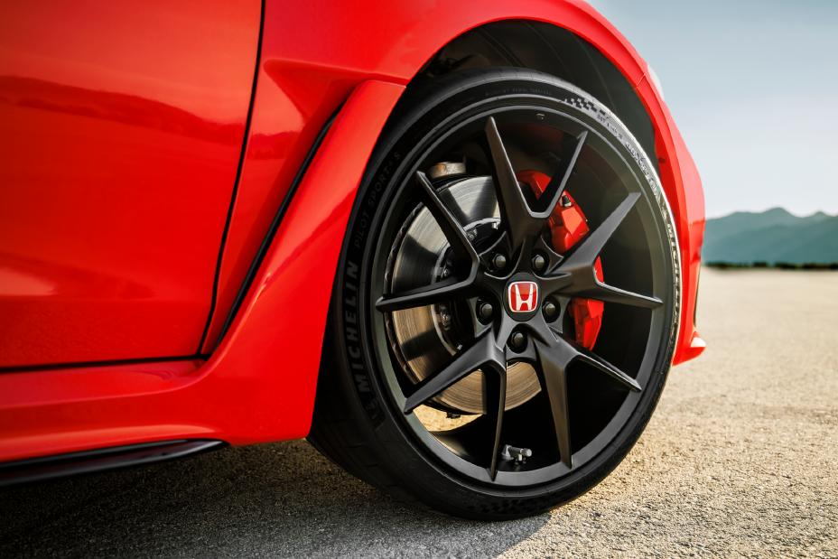 Official Honda photo of a Rallye Red Civic Type R 19-inch wheel with red Brembo caliper and Michelin Pilot Sport 4S