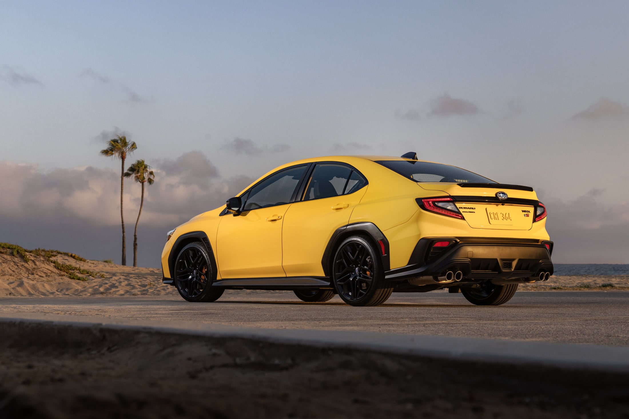 2026 Subaru WRX Series.Yellow rear three-quarter with gold Brembo calipers