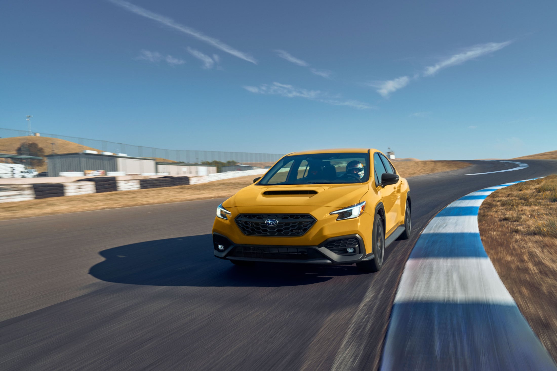 2026 Subaru WRX Series.Yellow on a racetrack
