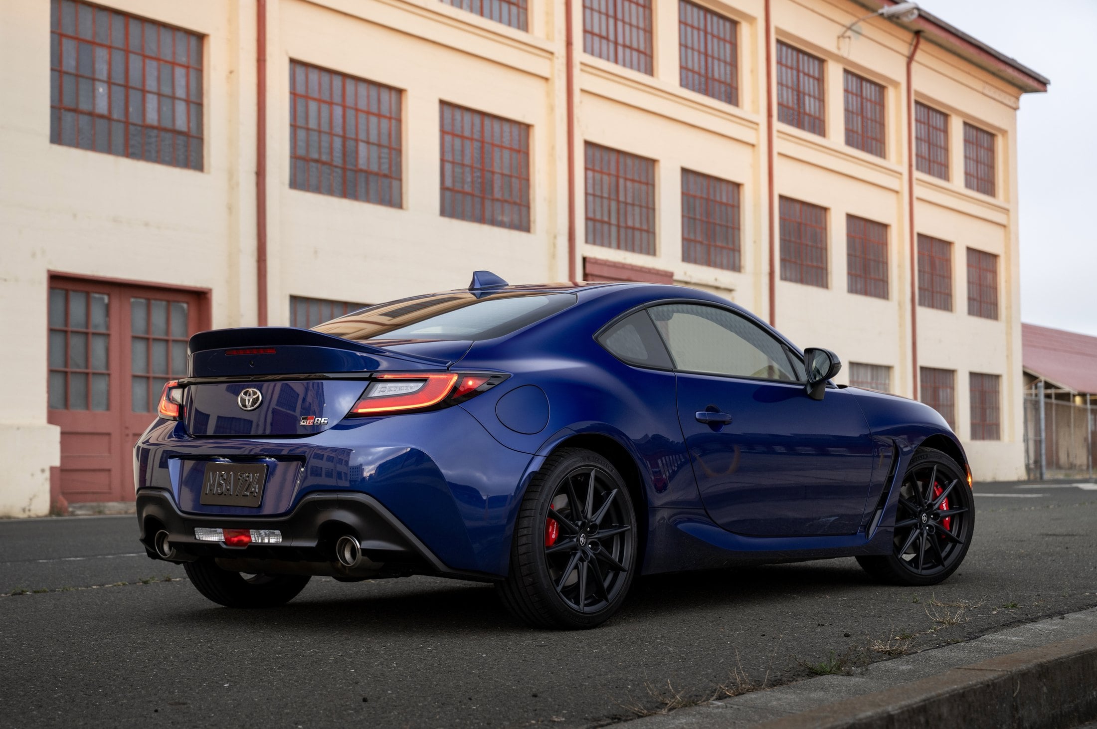 2027 Toyota GR86 Premium Trueno Blue rear three-quarter