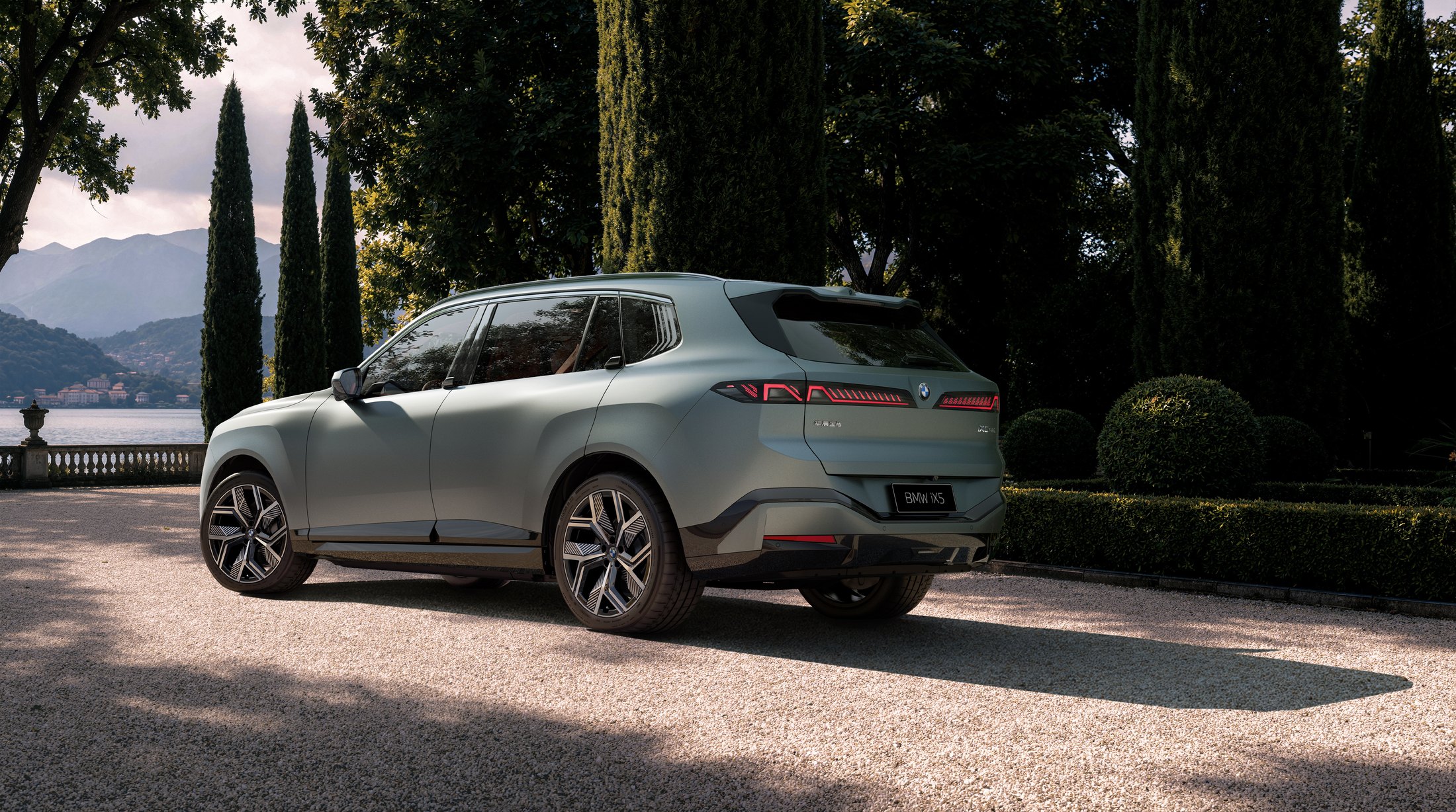 Official BMW photo of the 2027 iX5, rear three-quarter