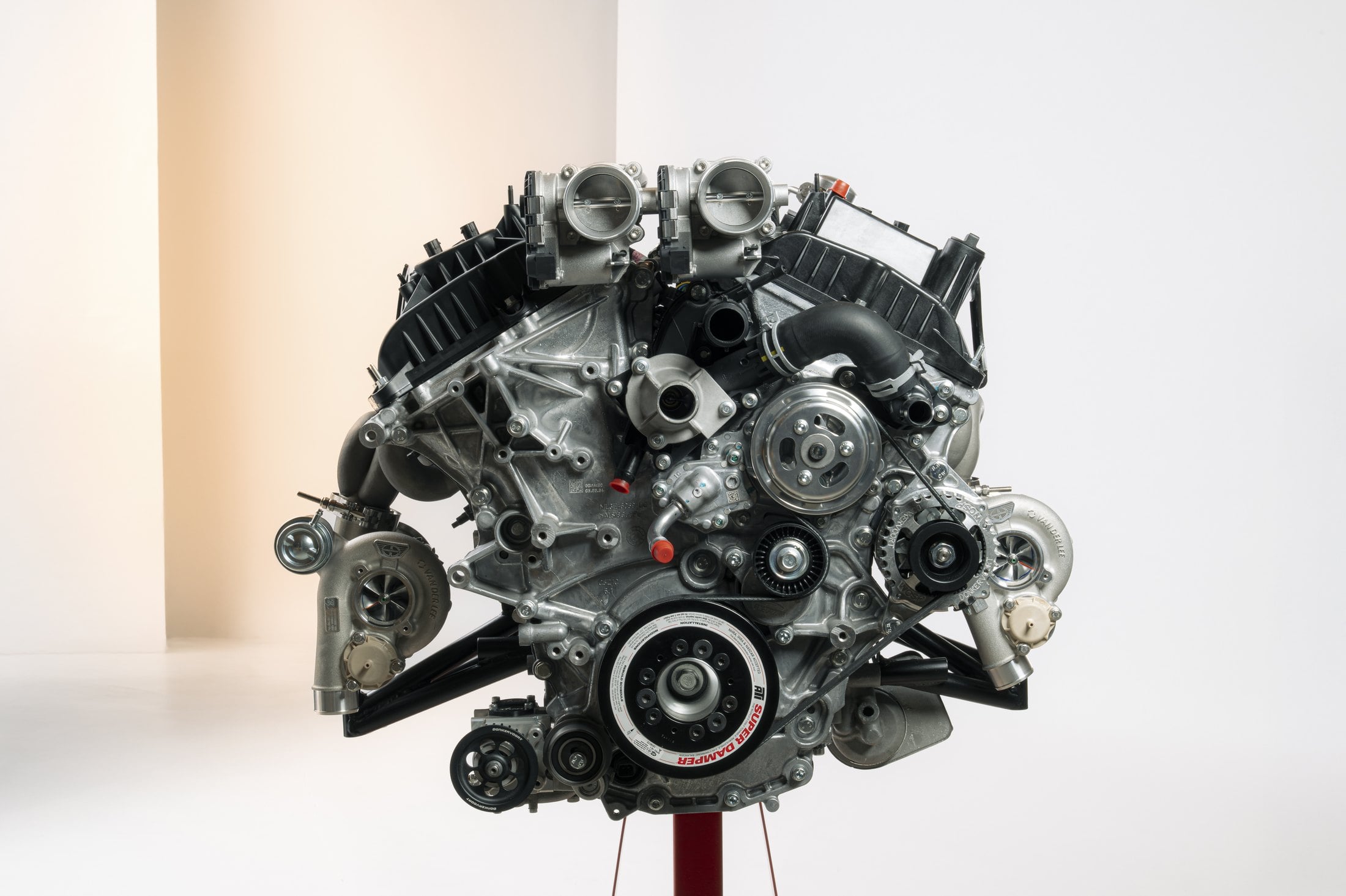 Official Donkervoort photo of the P24 RS PTC V6 with Van der Lee turbochargers on a stand