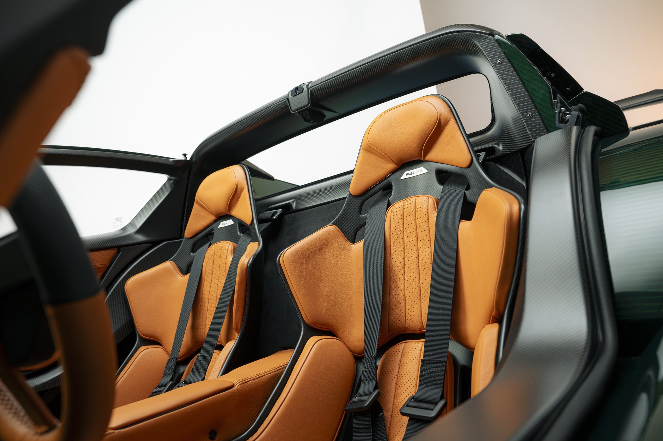 Official Donkervoort studio photo of the P24 RS Recaro seats in cognac leather with P24 RS badges