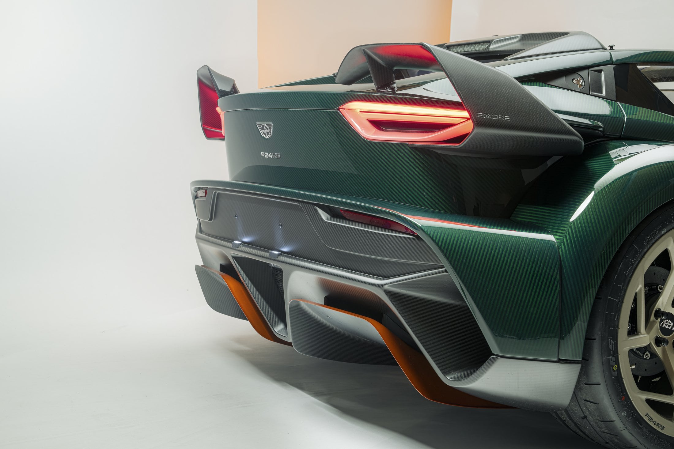 Official Donkervoort studio photo of the P24 RS rear three-quarter, wing, diffuser, and Nankang CR-S tyre