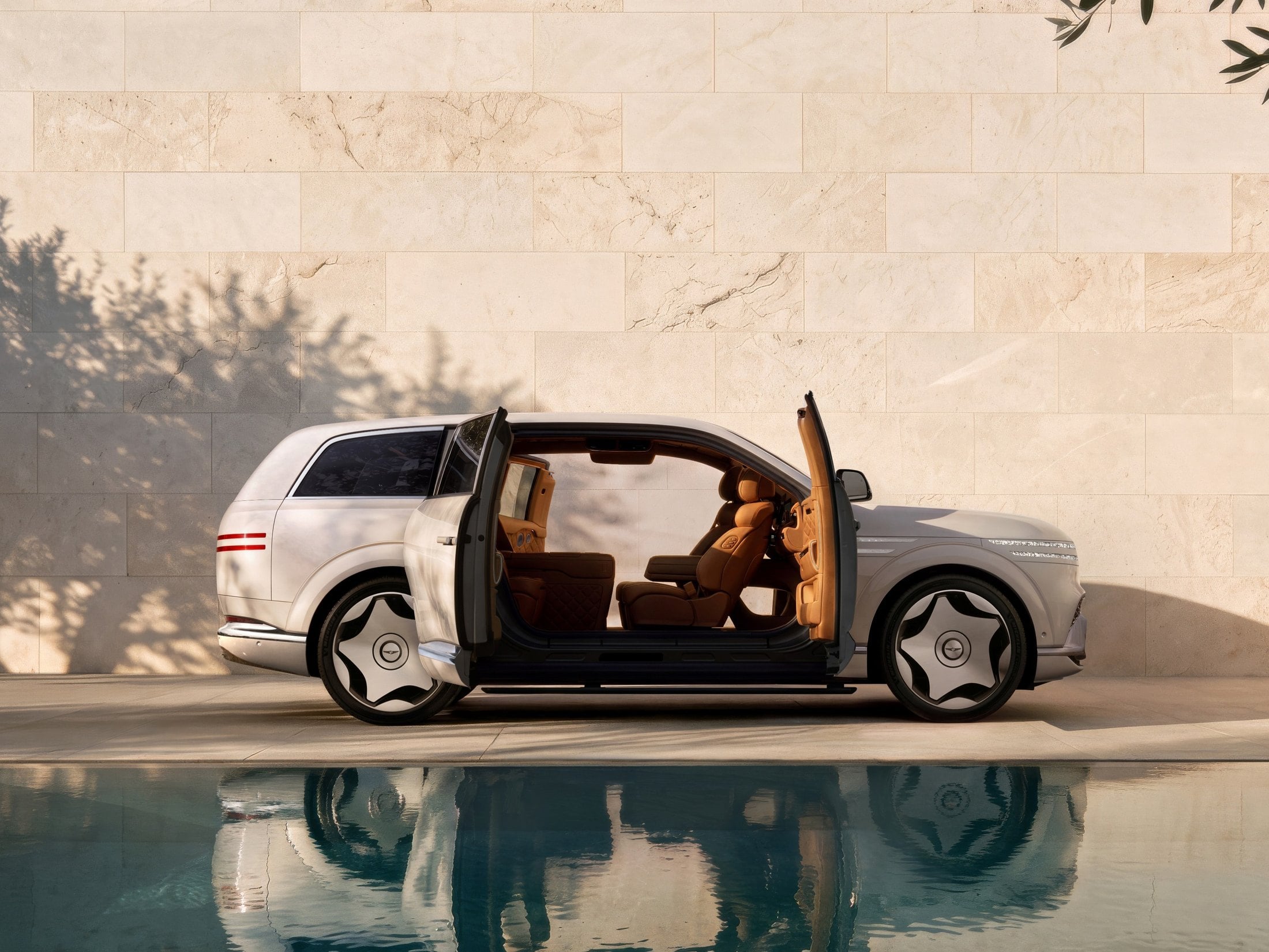 White Genesis GV90 Neolun with Neolun Arch Gate coach doors open, showing the pillarless cabin