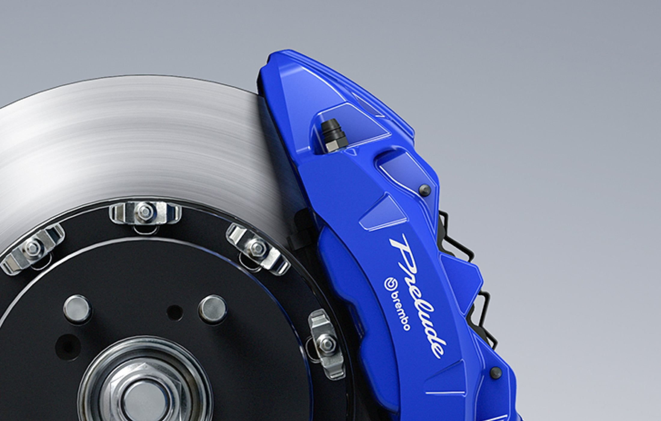 Official Honda photo of the Prelude-blue Brembo four-piston front caliper and two-piece rotor