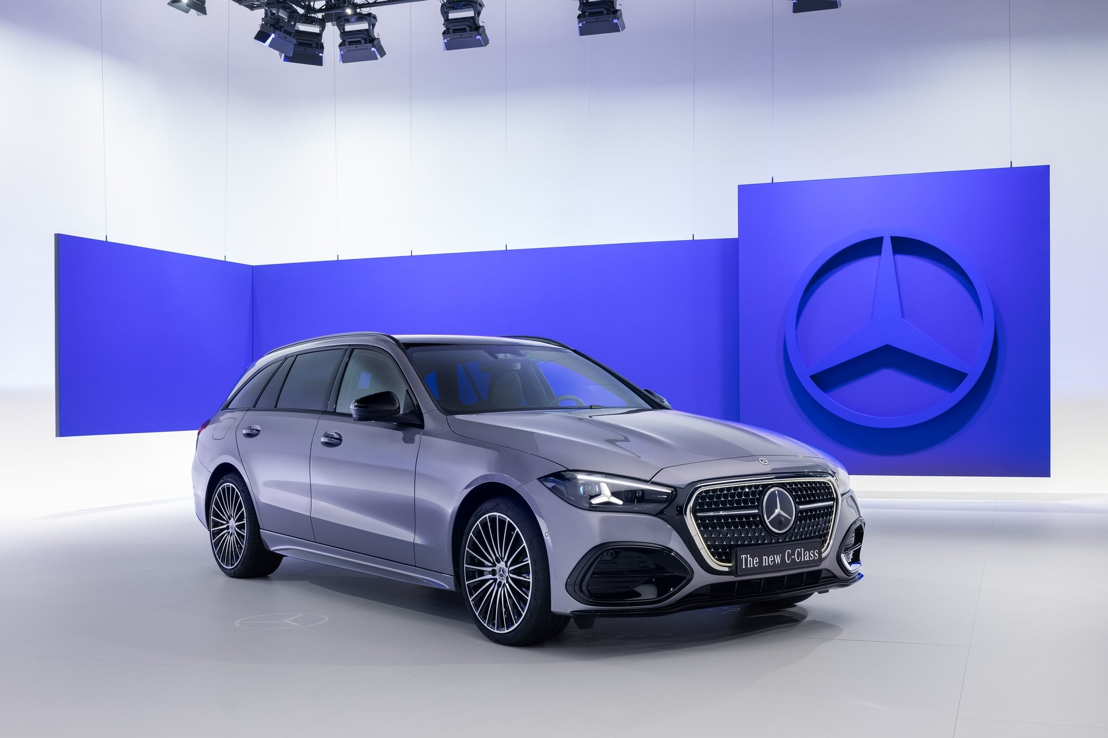 Official photo of the silver Mercedes-Benz C-Class Estate, front three-quarter studio shot