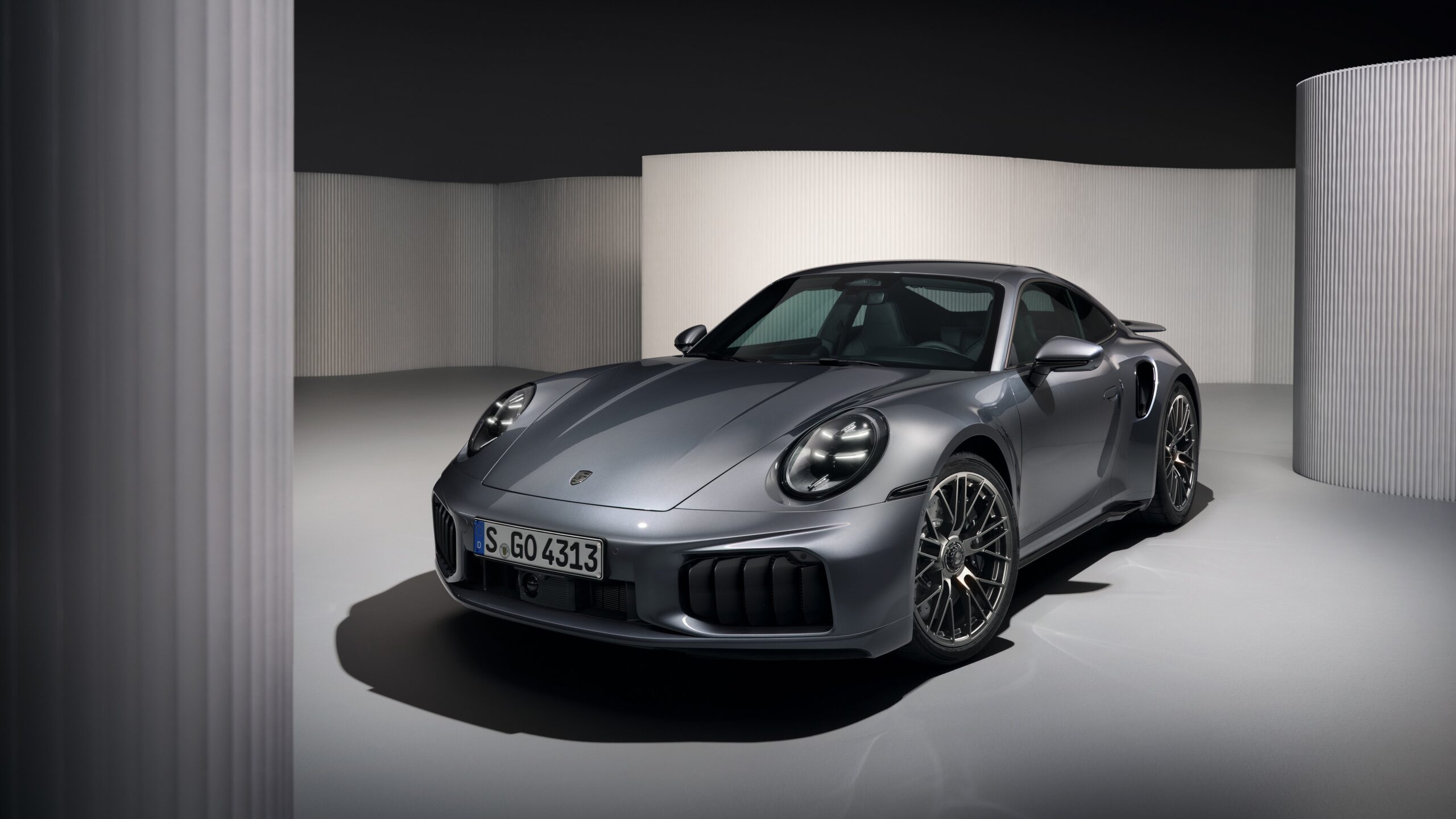 Official Porsche photo of the 2026 911 Turbo S Coupe, front three-quarter studio shot