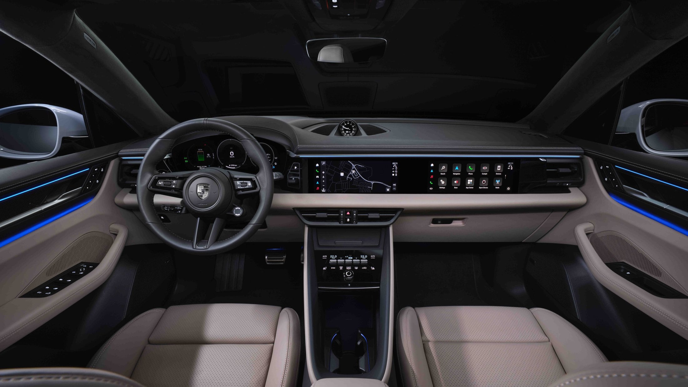 Official Porsche photo of the Macan Electric cockpit with triple displays