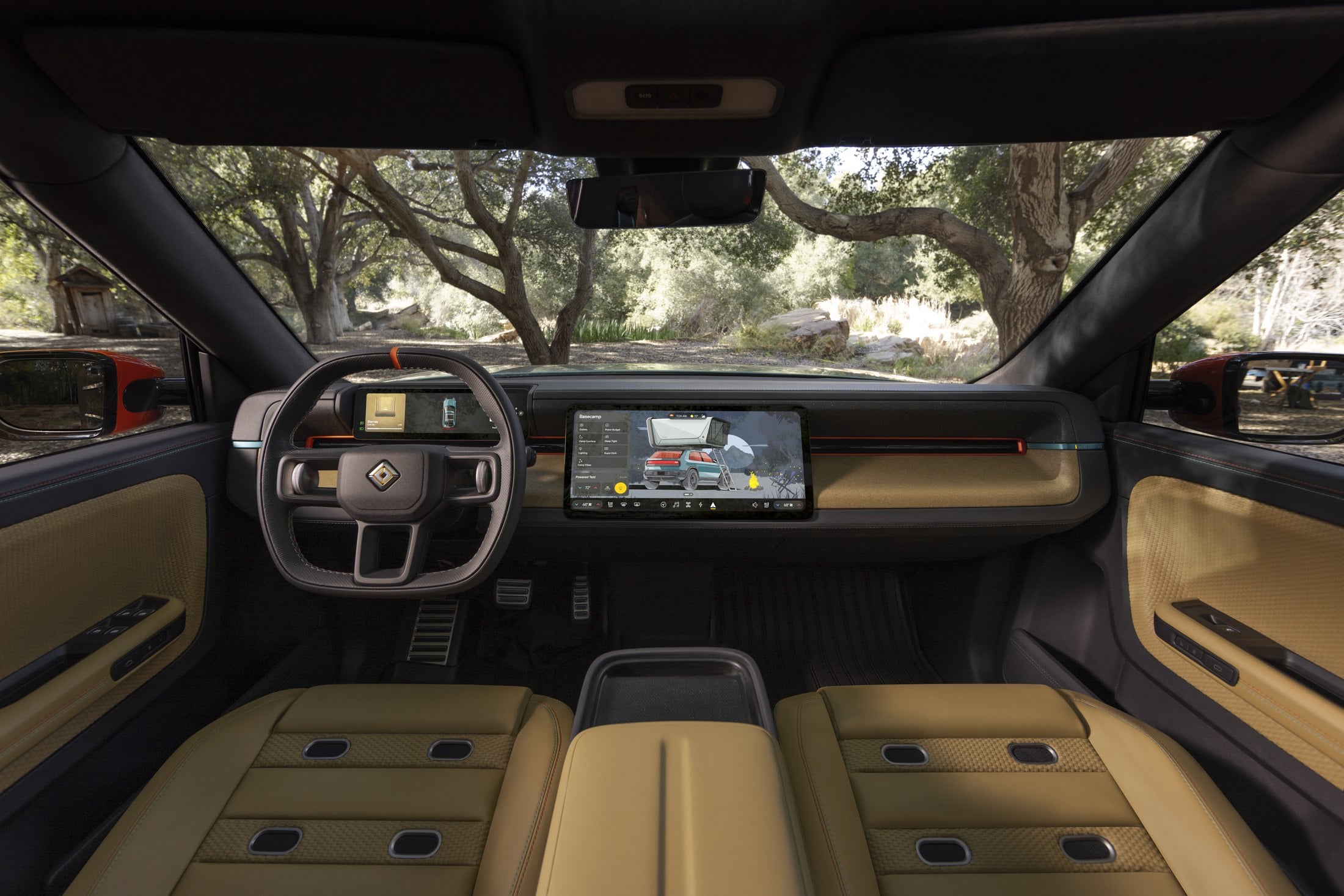 Official Rivian photo of the R2 cabin, looking forward from the rear seats
