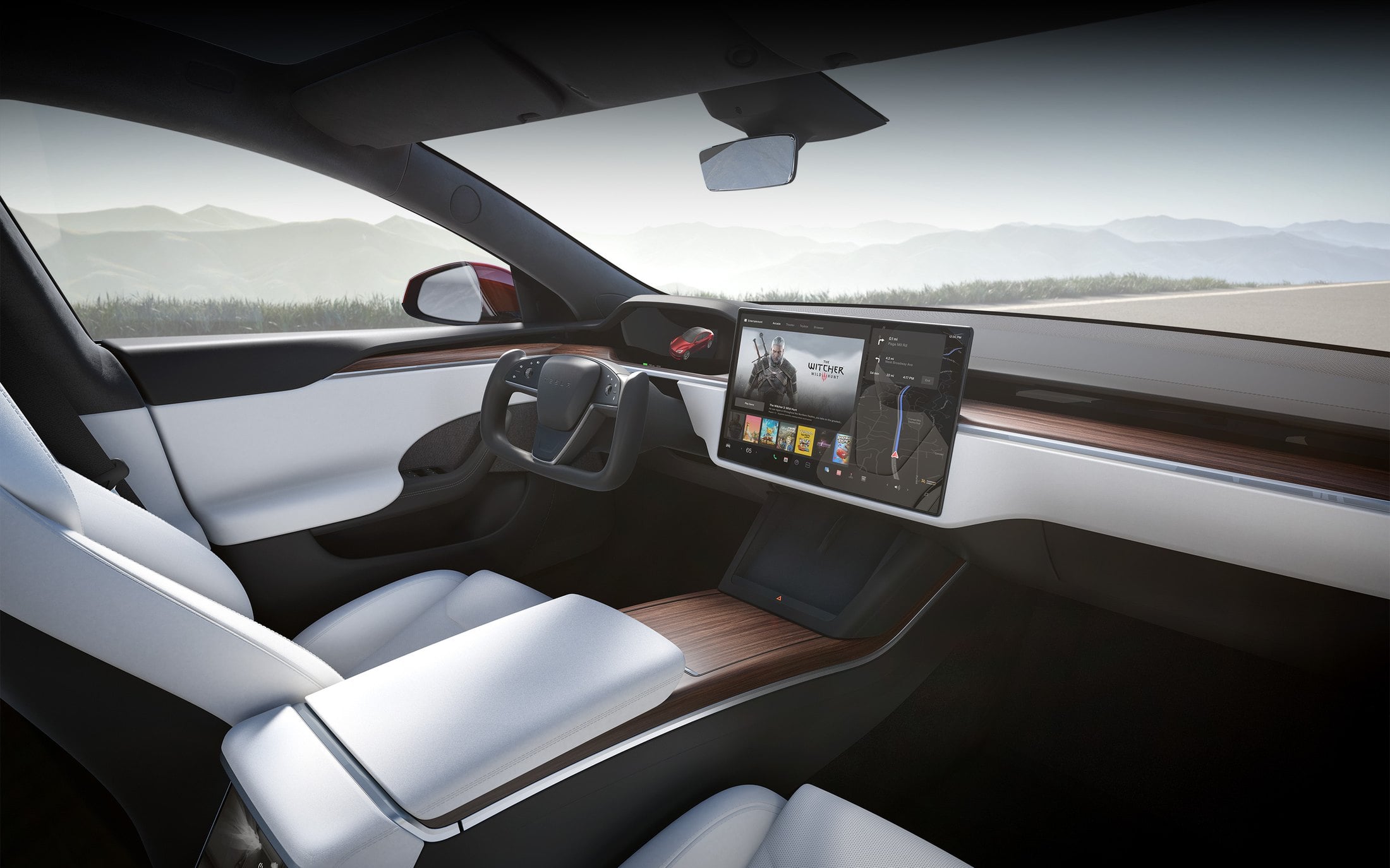 Official Tesla photo of a Model S Plaid cabin with white seats, wood trim, and a yoke