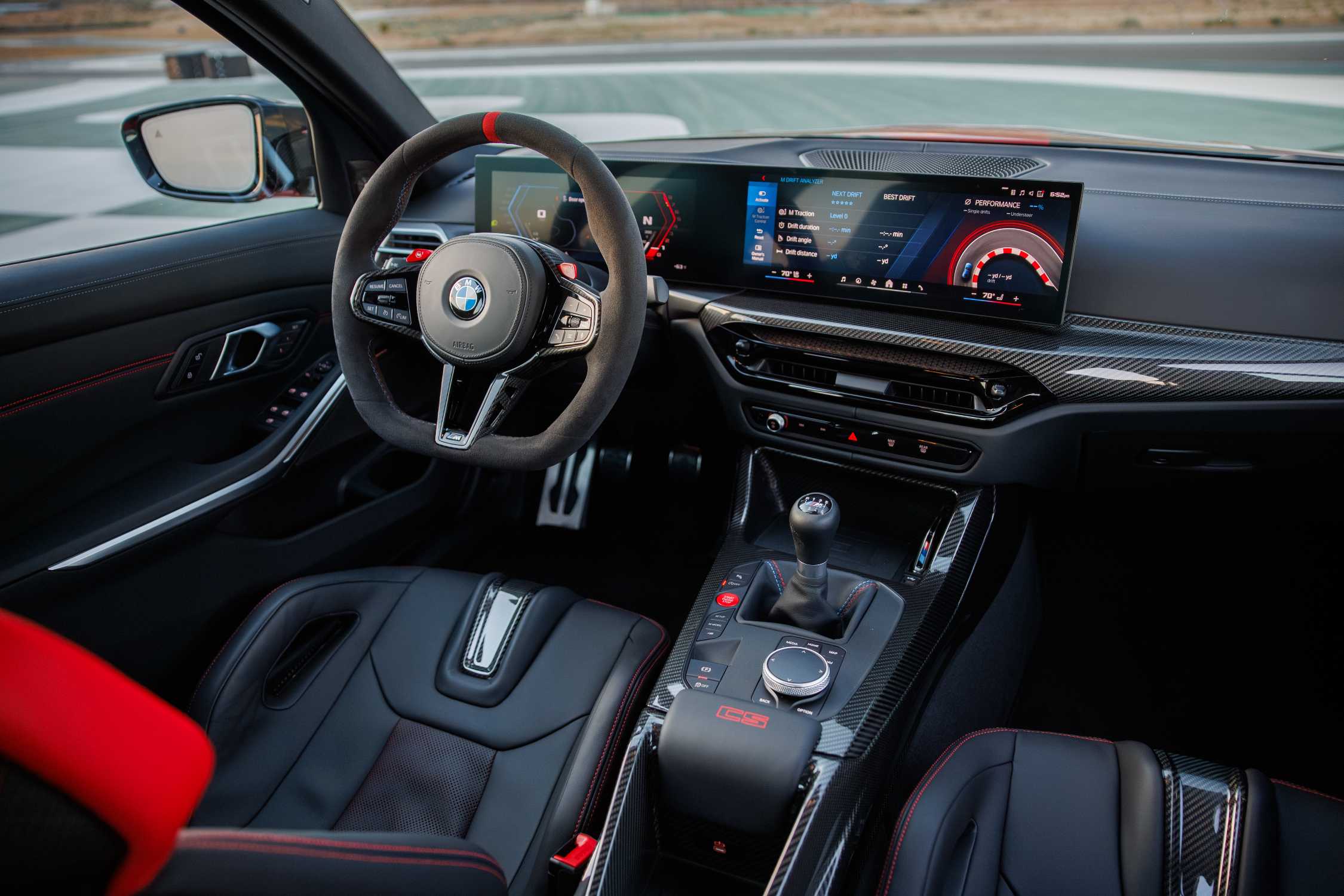 Official BMW photo of the 2027 M3 CS Handschalter six-speed manual shifter, three pedals, and M Carbon buckets