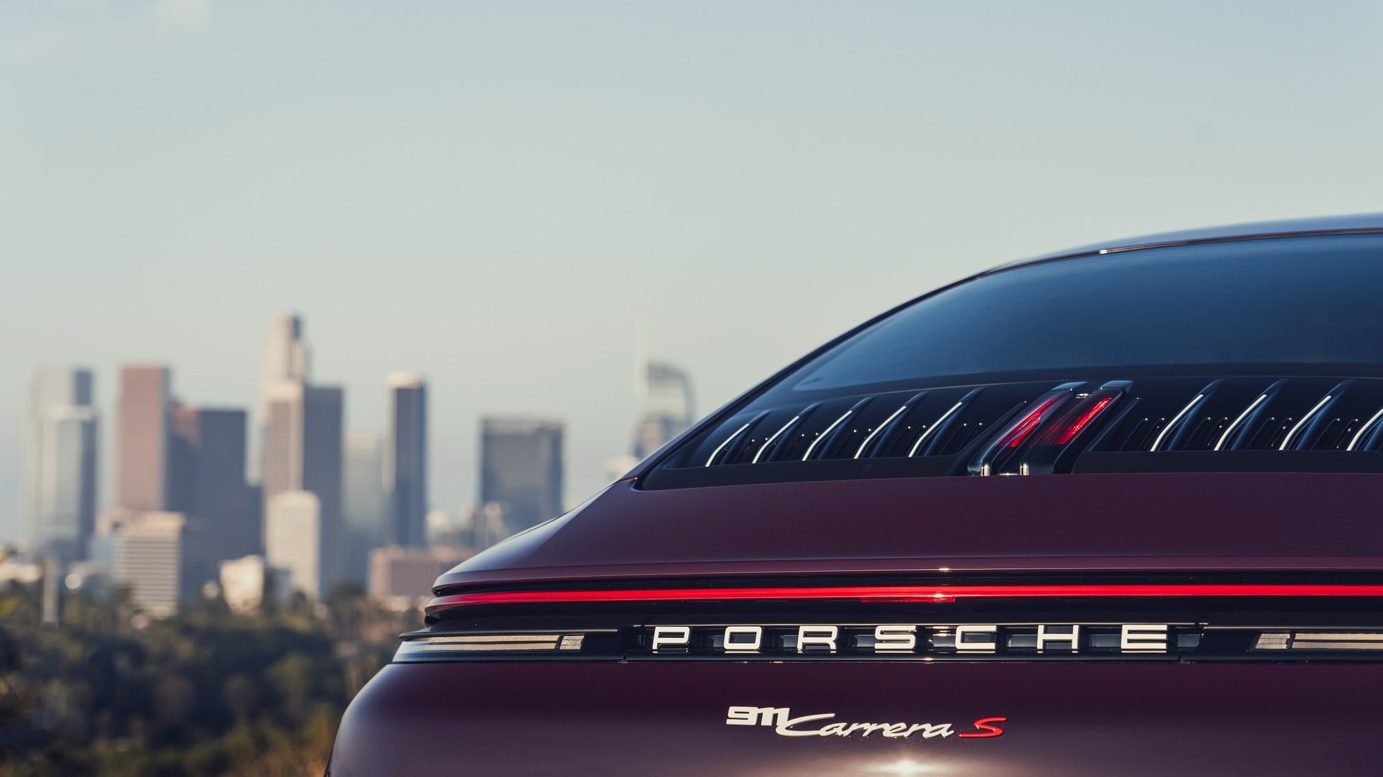 Official Porsche photo of the 911 Carrera S rear badge and engine grille on the MT Package coupe