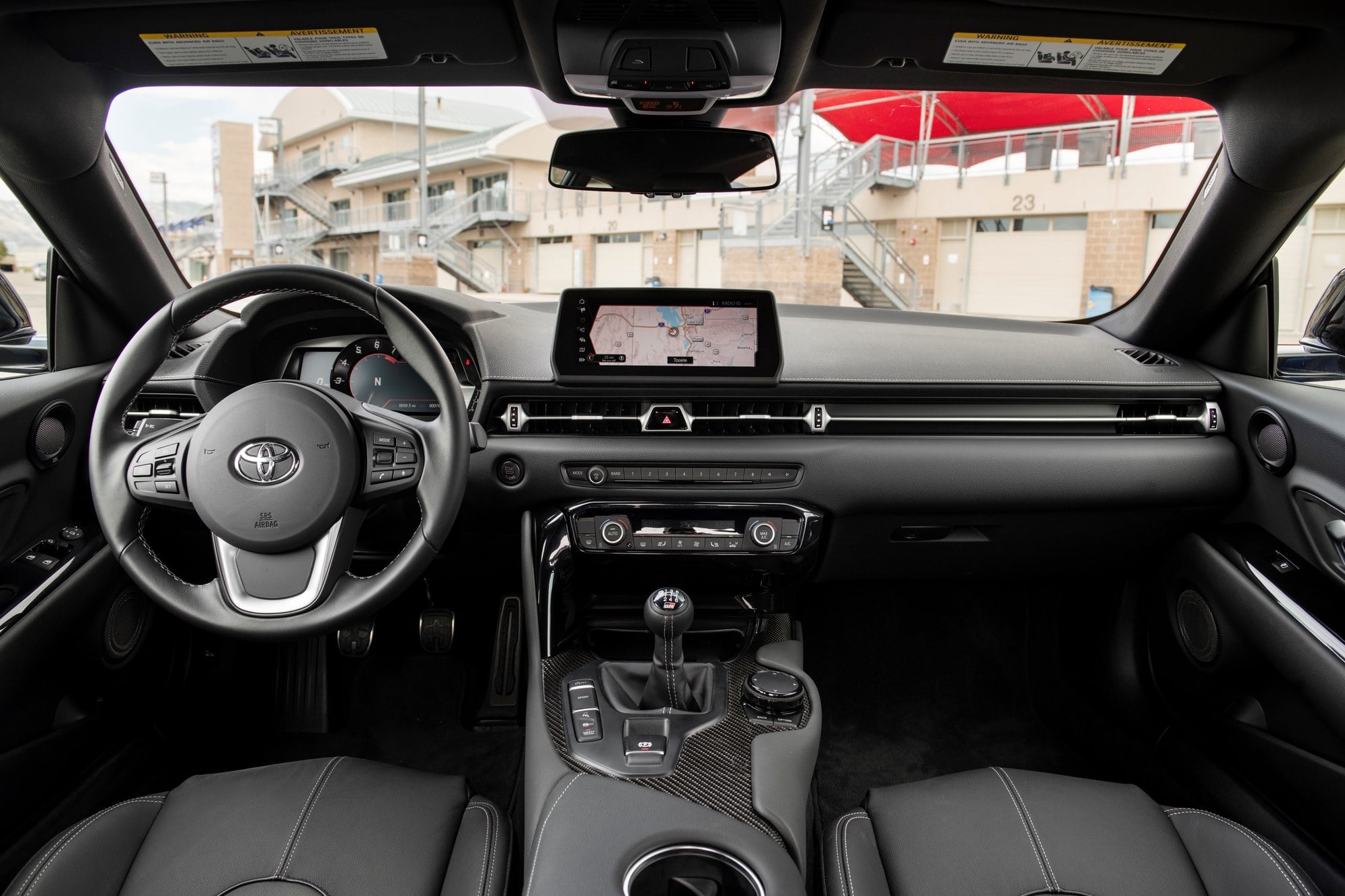 Official Toyota photo of a 2026 GR Supra manual front three-quarter in Stratosphere Blue