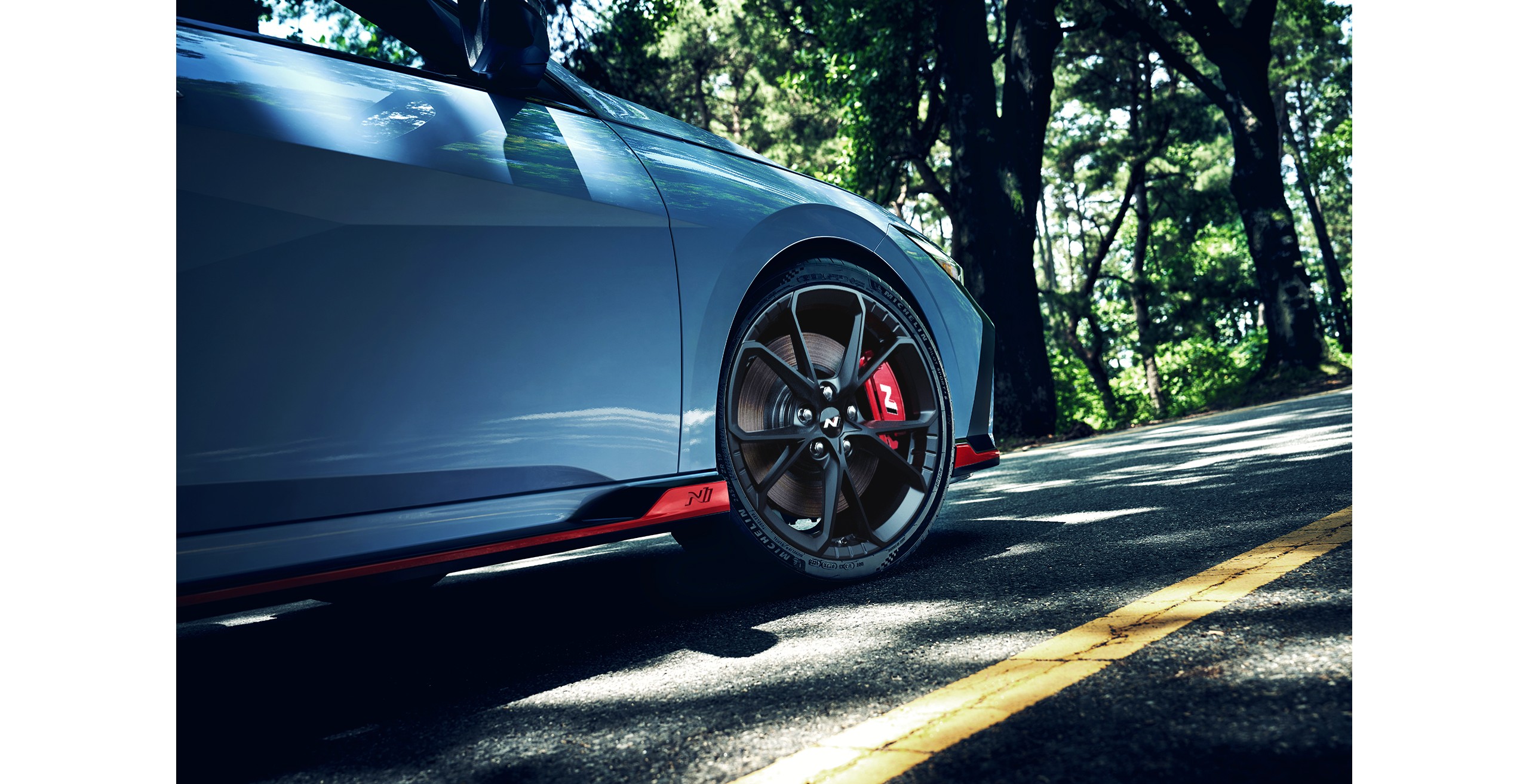 Official Hyundai photo of Elantra N 19-inch wheel and red N brake caliper