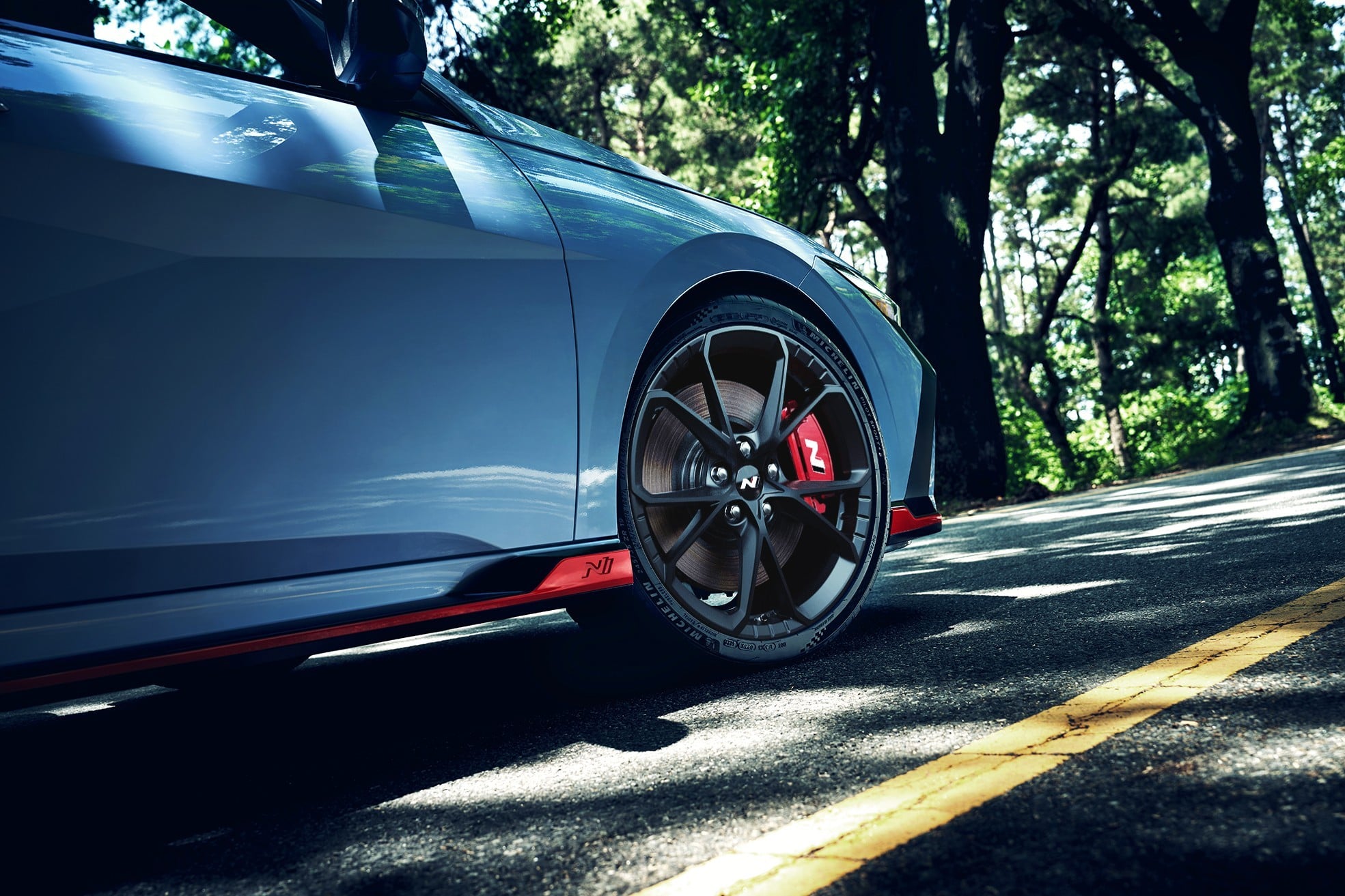 Official Hyundai photo of 2026 Elantra N 19-inch wheel and red N brake caliper