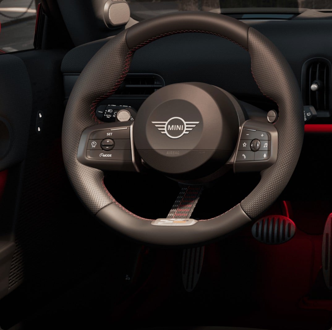 Official MINI photo of JCW Sport Steering Wheel with paddle shifters and two-pedal footwell