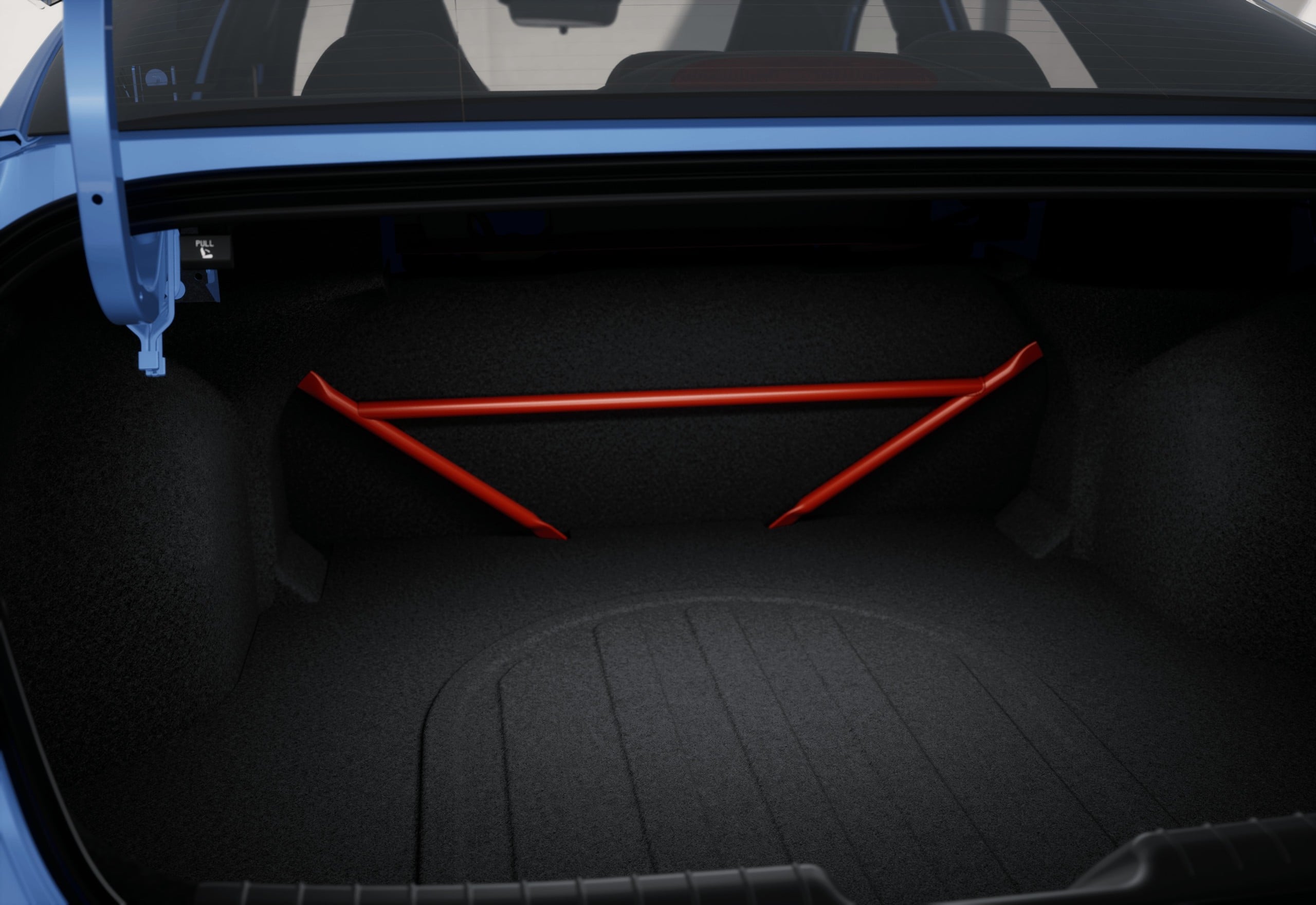 Official Hyundai photo of red rear chassis brace in the trunk of a Performance Blue Elantra N