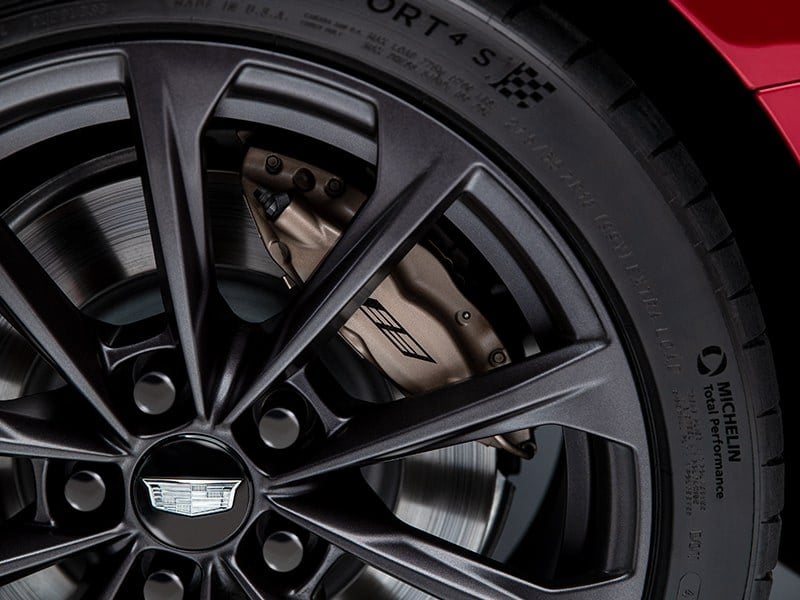 Official Cadillac photo of CT4-V Blackwing Brembo performance brakes behind a dark alloy wheel