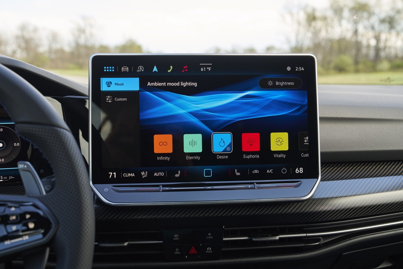 Official Volkswagen photo of the Golf R cockpit touchscreen with paddle shifter visible