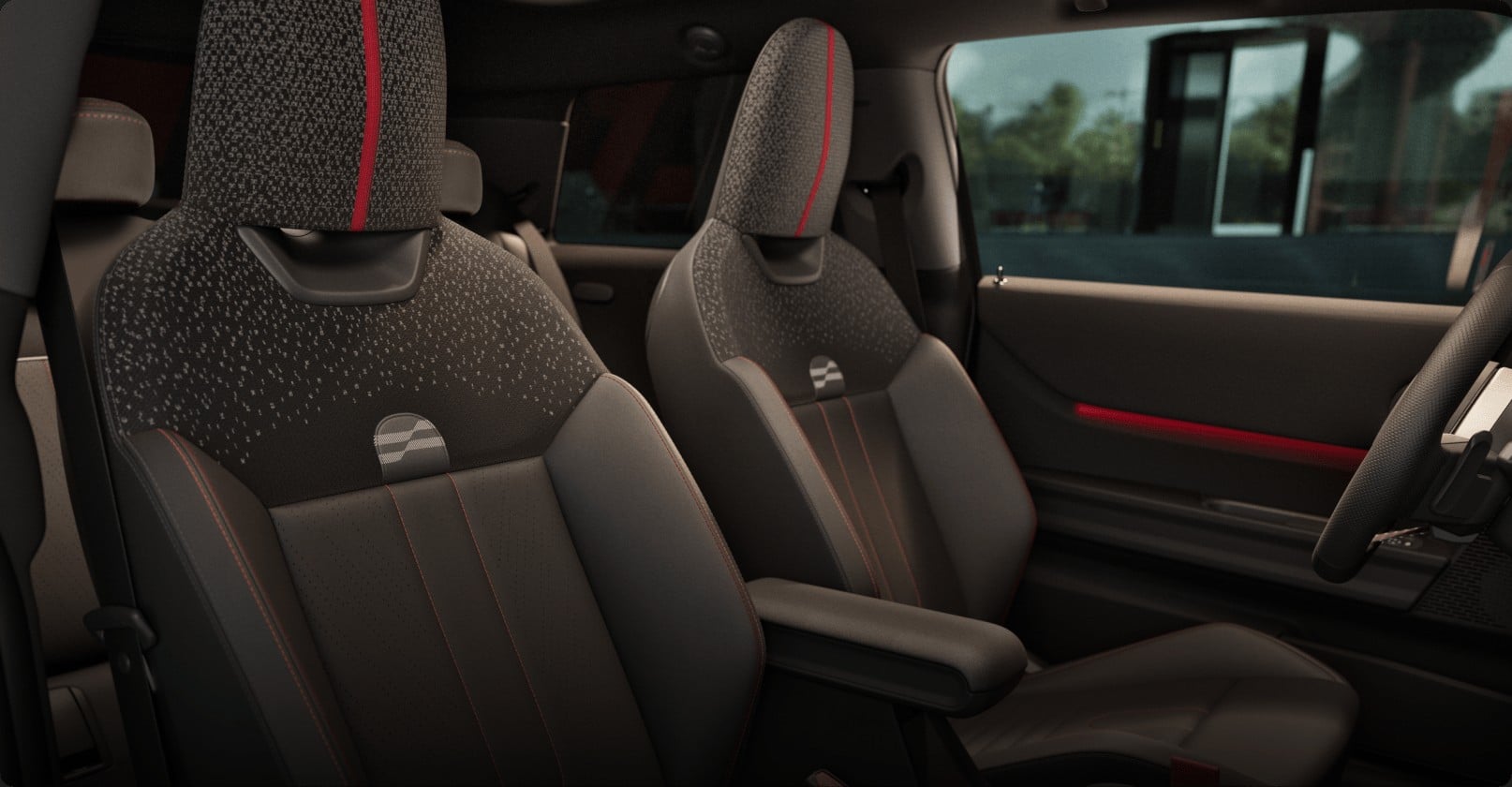 Official MINI photo of JCW Sport Seats with red accents and paddle shifter visible