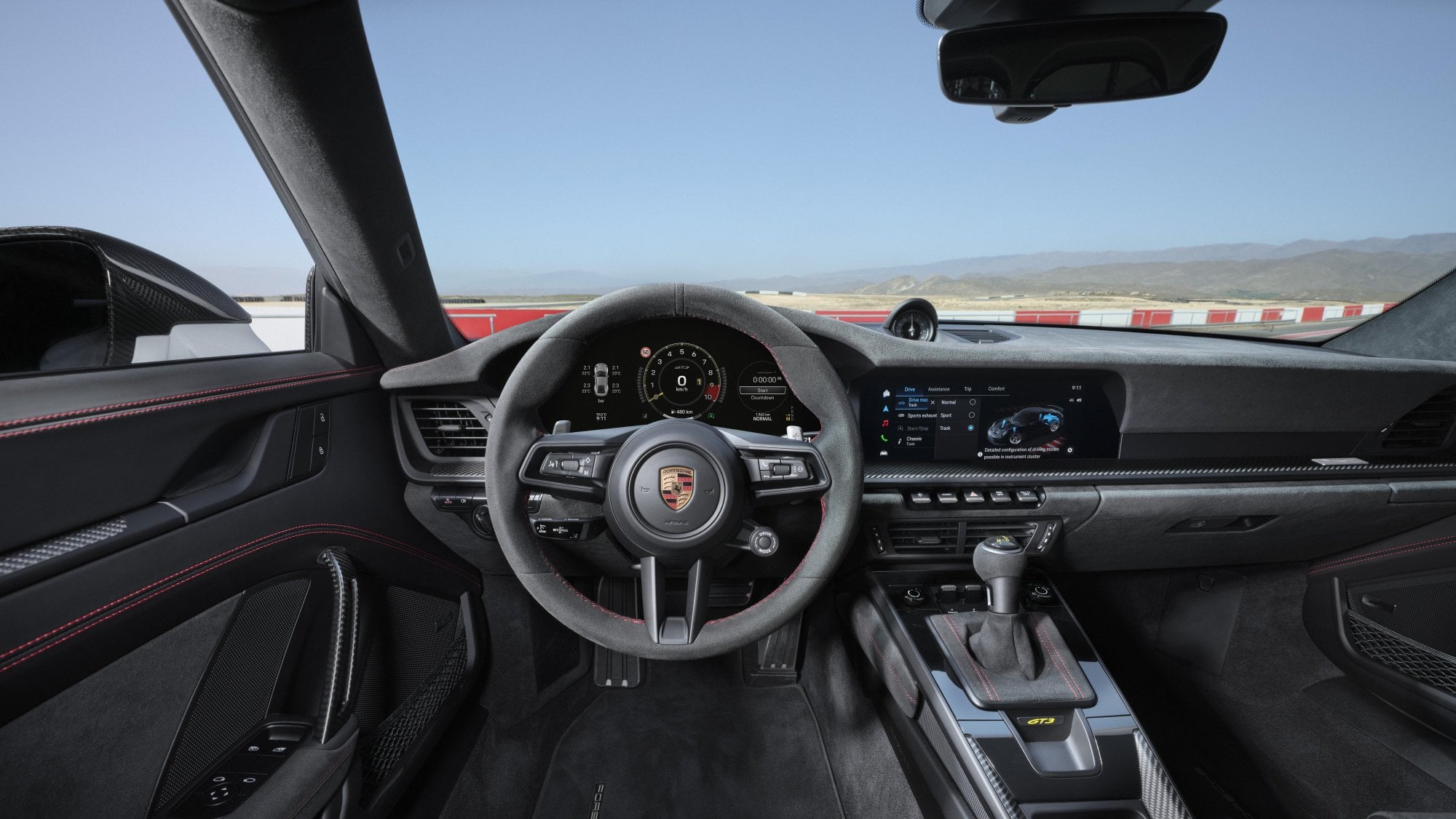 Official Porsche photo of the 911 GT3 cockpit with six-speed GT Sport manual shifter and three pedals