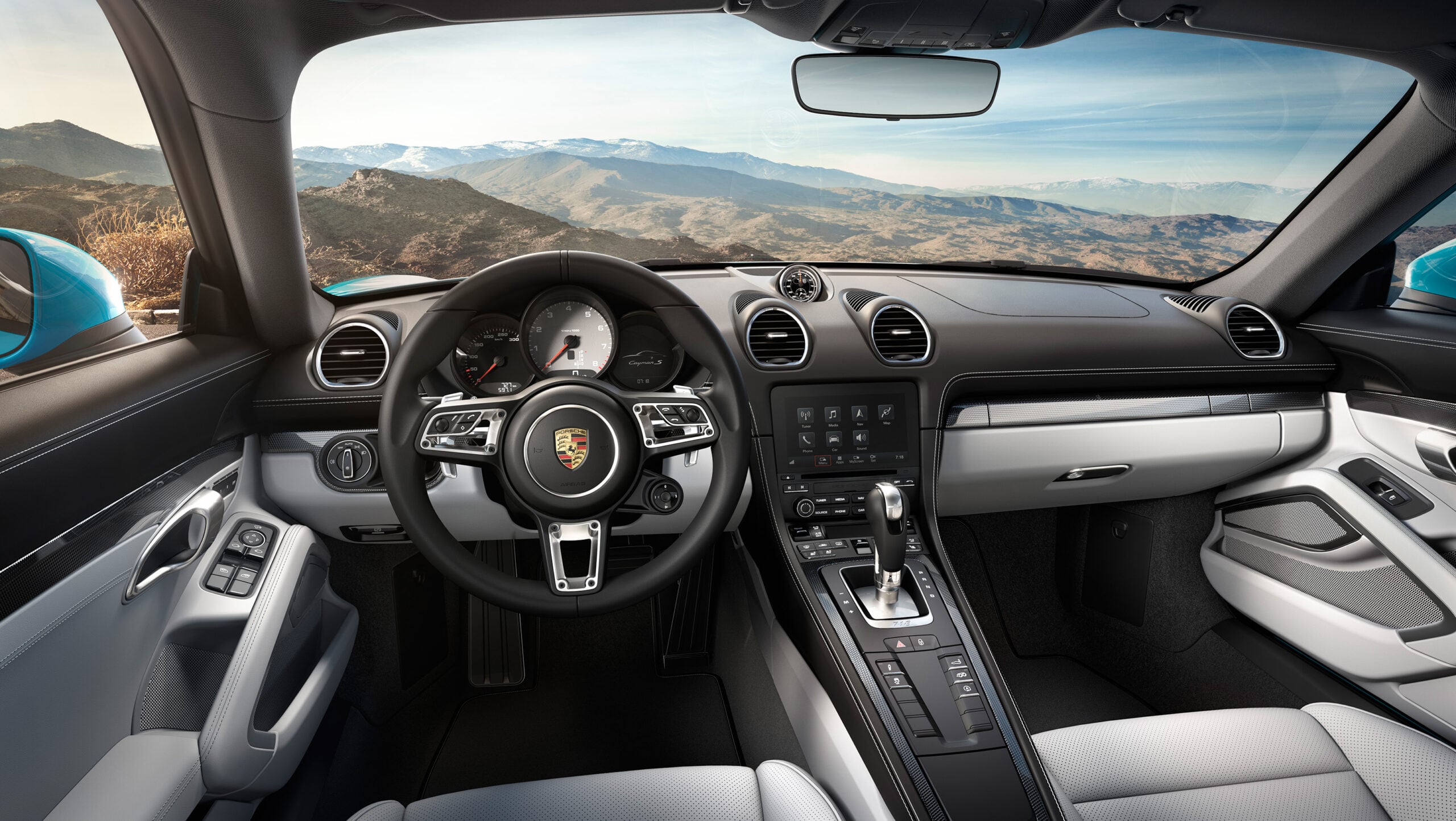 Official Porsche photo of 718 Cayman rear three-quarter