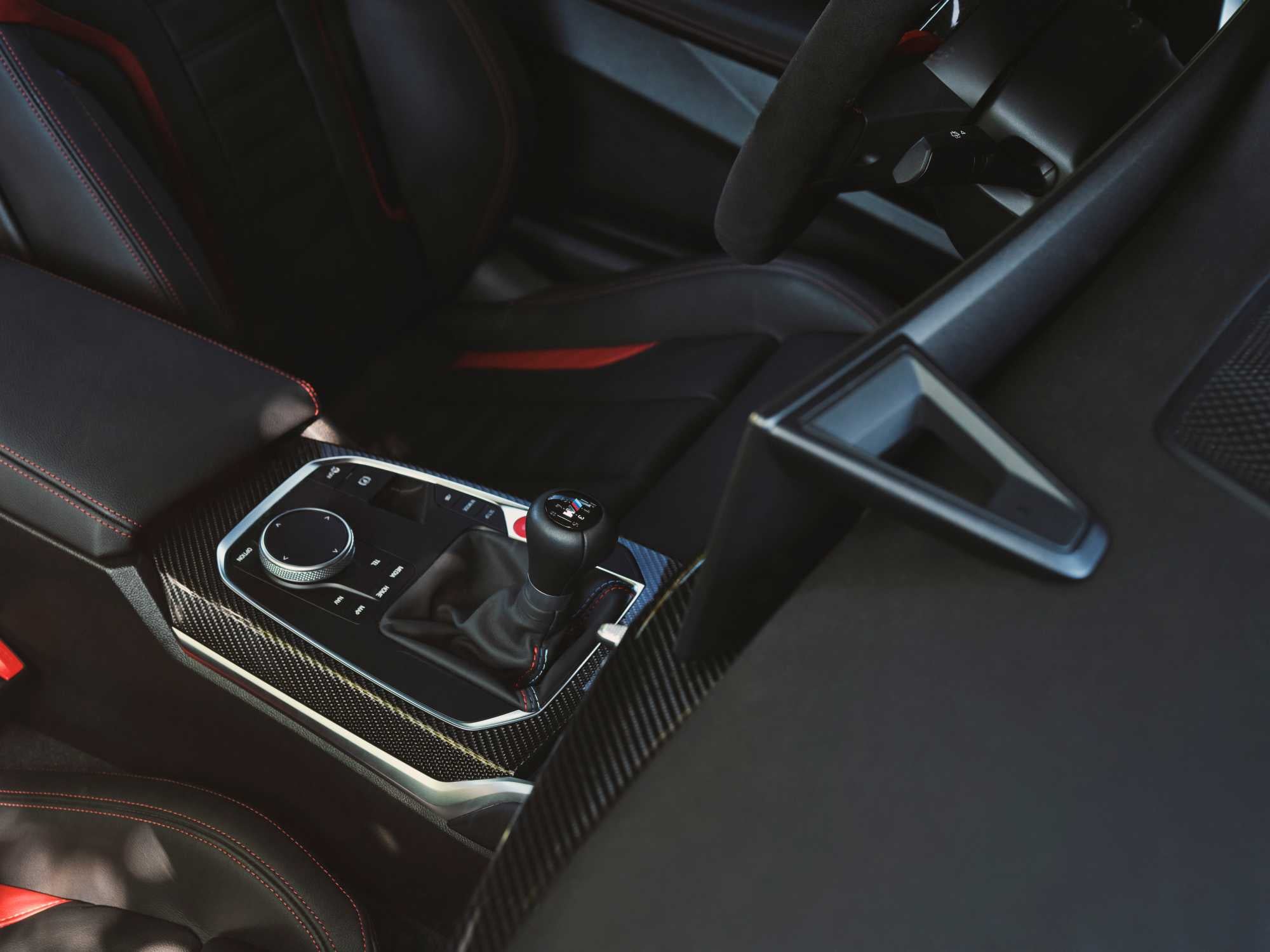 Official BMW photo of the BMW M2 six-speed manual shifter and carbon console