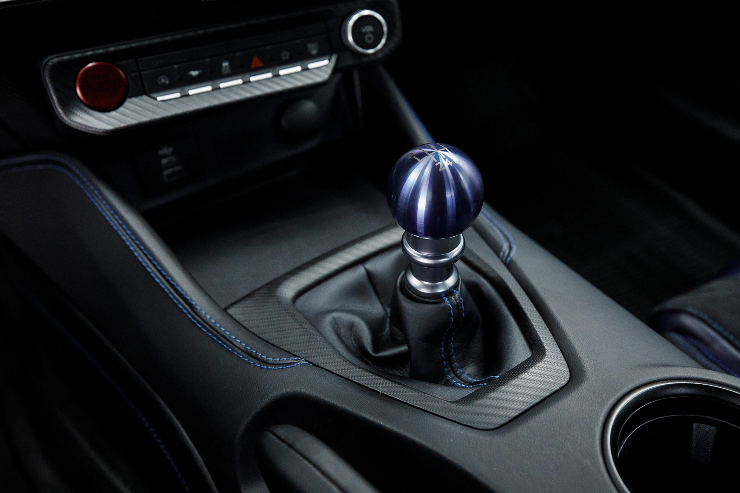 Official Ford close-up of Dark Horse titanium-anodized blue six-speed manual shift knob