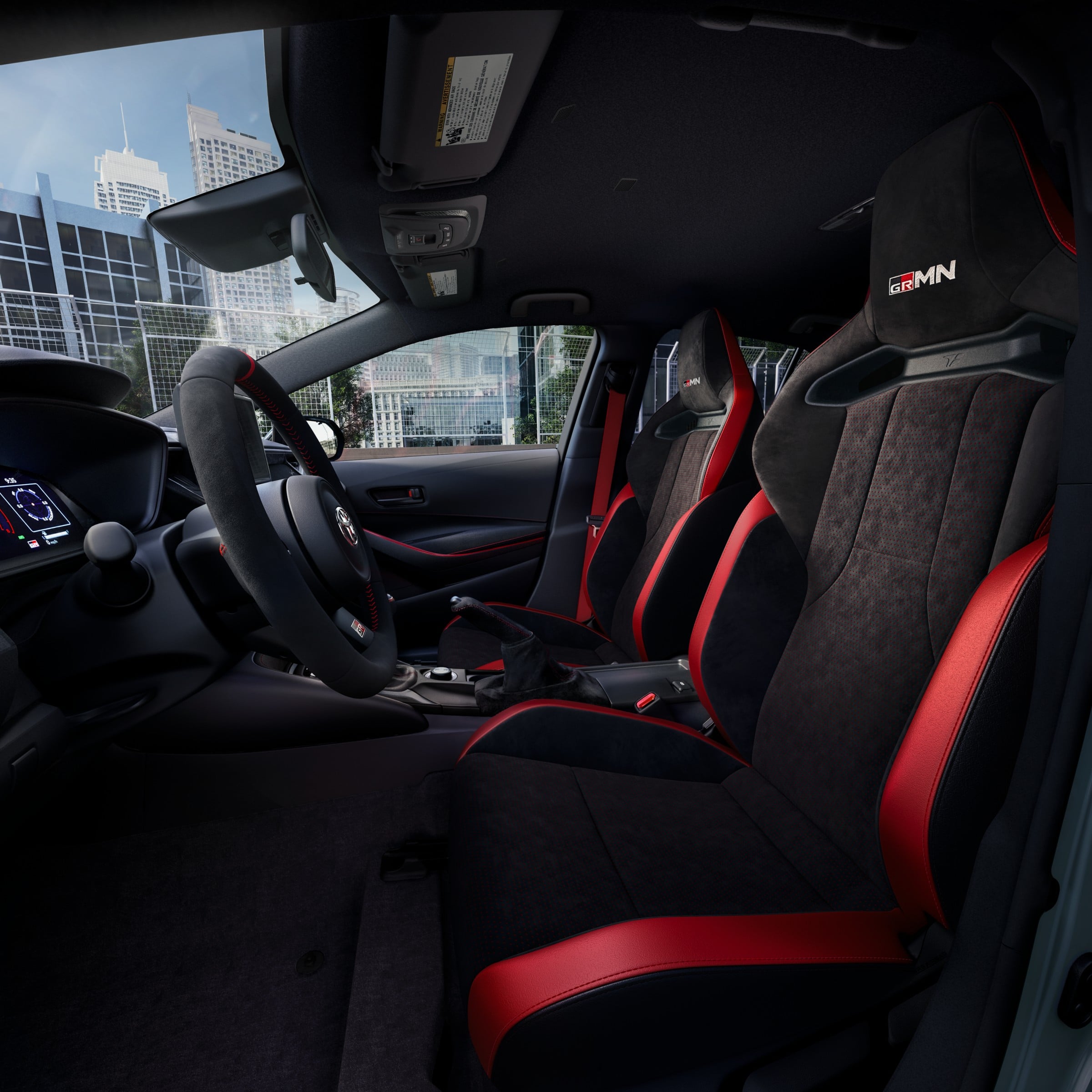 Official Toyota photo of 2026 GRMN Corolla cabin with six-speed iMT shifter and GRMN seats