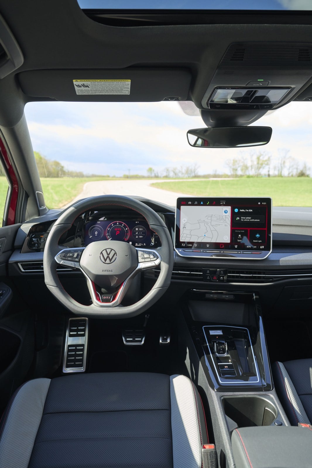 Official VW photo of Golf GTI cockpit with DSG gear selector and two pedals