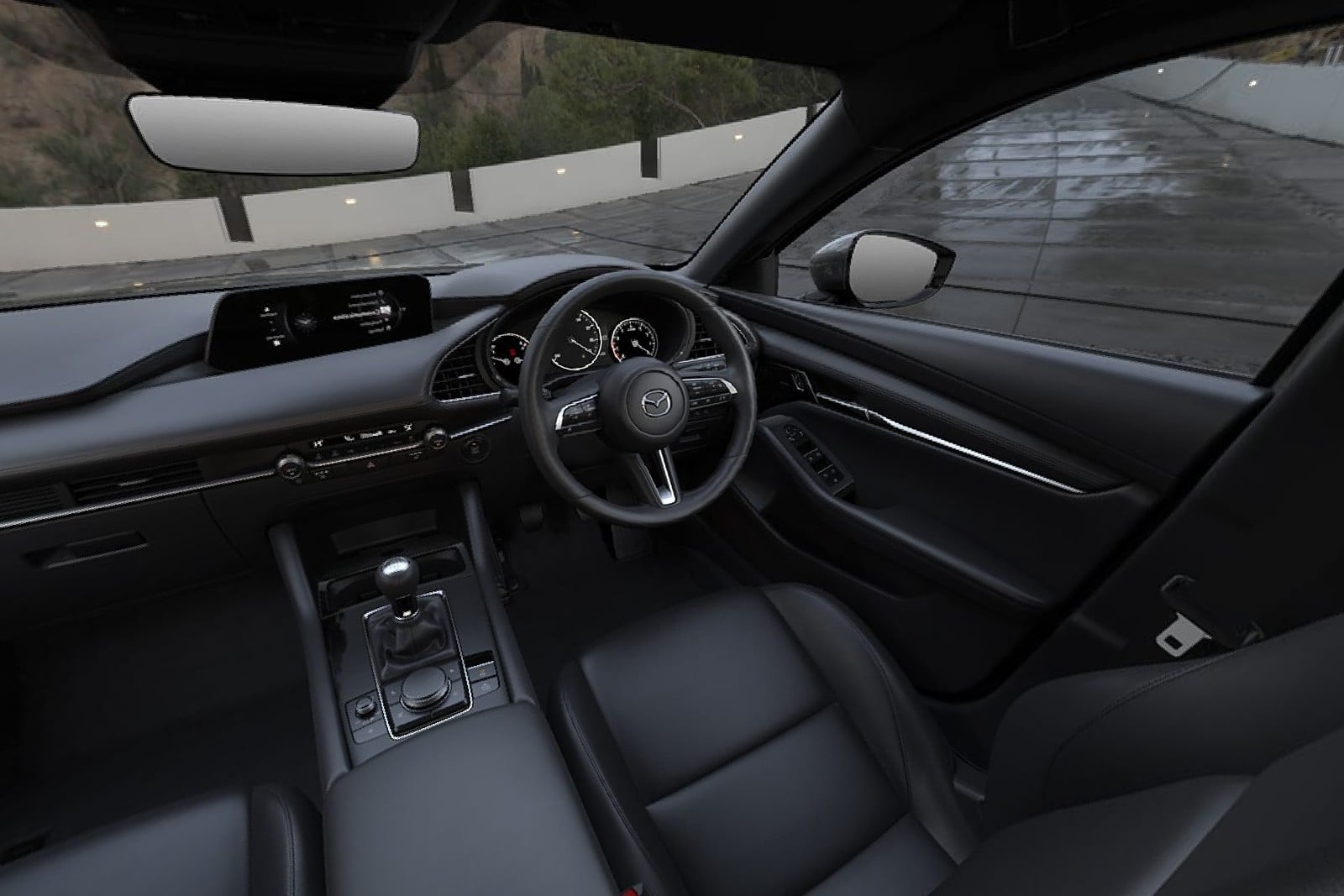 Official Mazda photo of a Mazda3 Hatchback Premium cabin with six-speed manual shifter