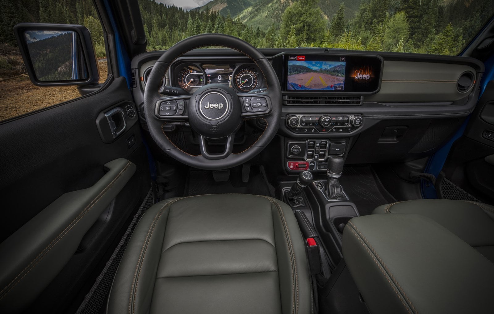 Official Jeep photo of the 2026 Jeep Gladiator Mojave X cabin with the eight-speed automatic gear selector and transfer-case lever