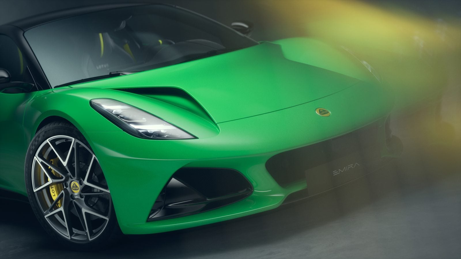 Official Lotus photo of the Emira V6 SE nose and headlight in Eos Green