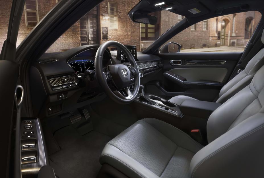 Official Honda photo of a Civic Hatchback cabin showing a two-pedal CVT layout