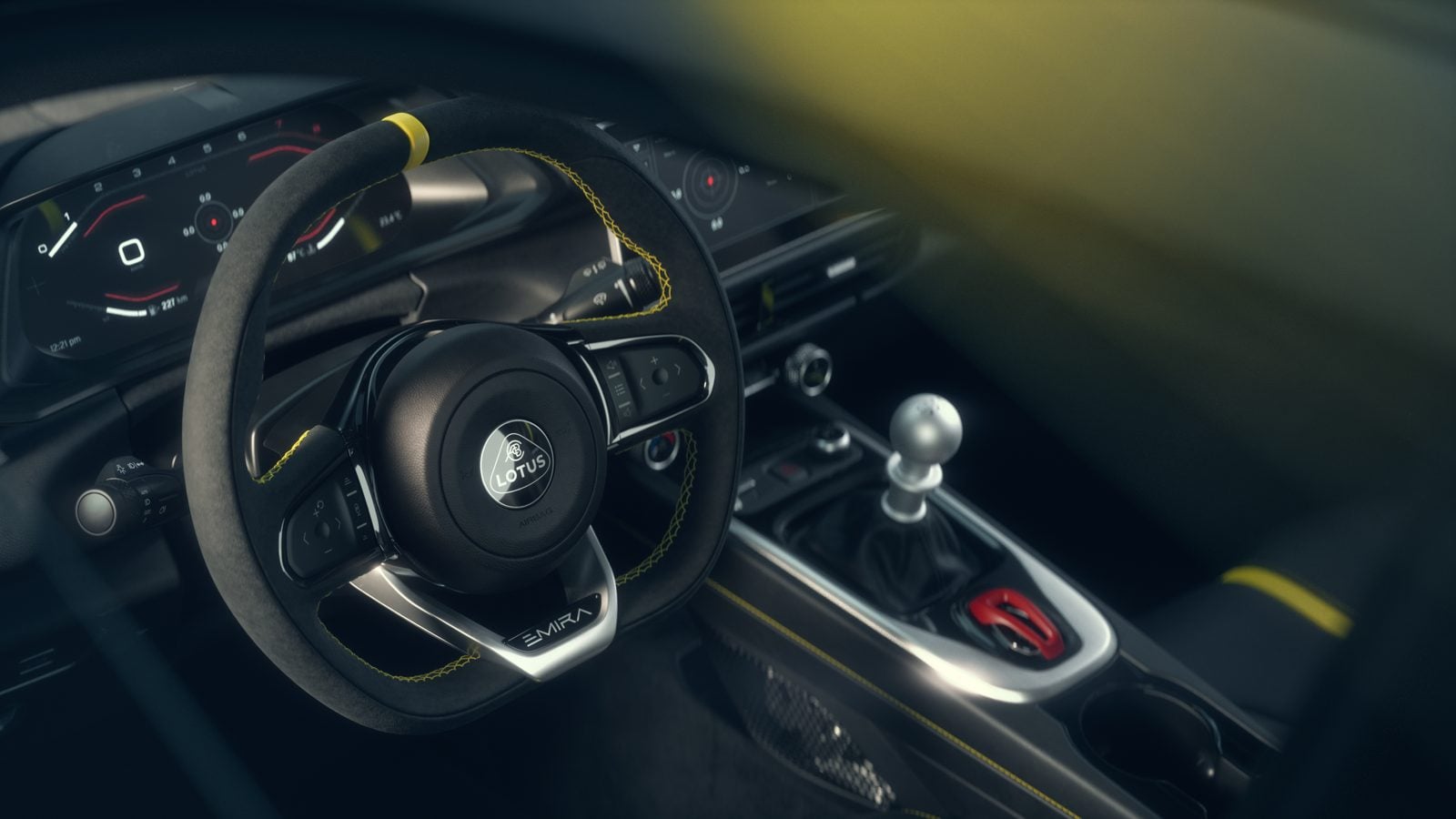 Official Lotus photo of the Emira V6 SE steering wheel, digital cluster and manual shifter