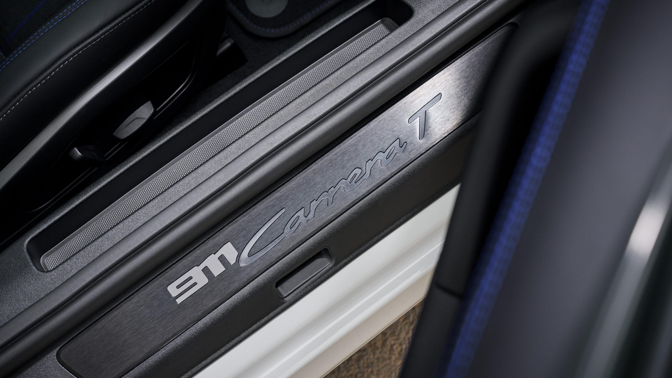 Official Porsche photo of 911 Carrera T illuminated door-sill guard