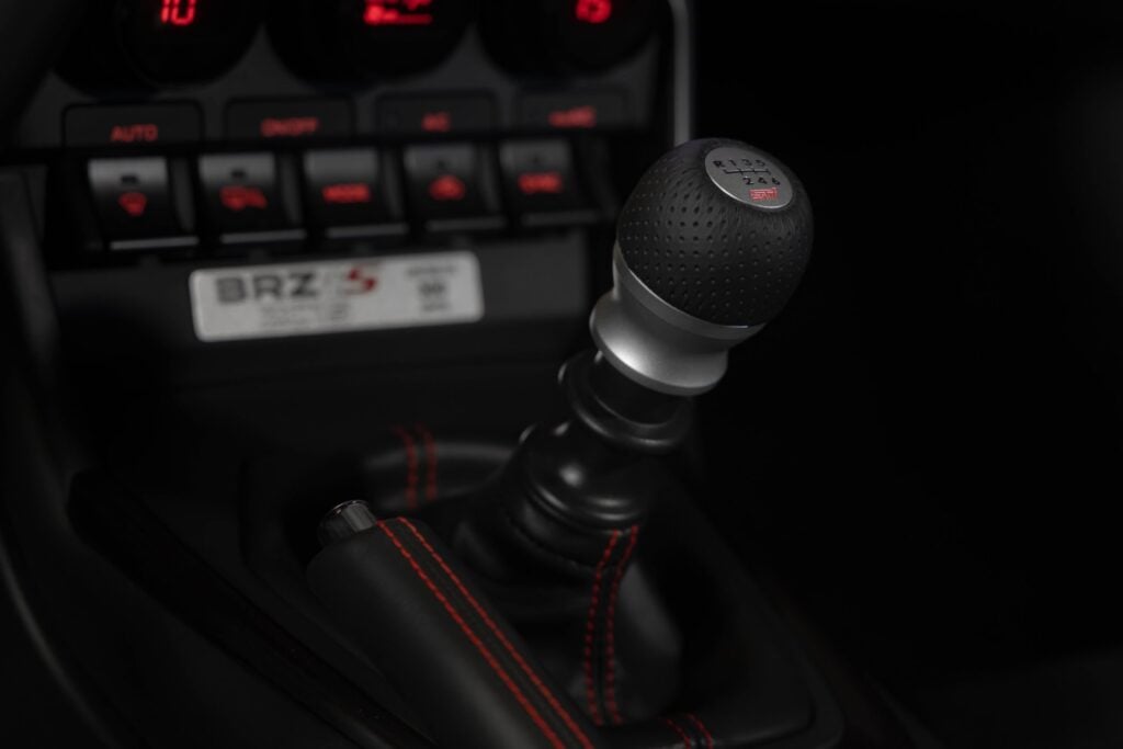 Official Subaru photo of the STI aluminum and leather short shifter and ZC15 plaque in the 2027 Subaru BRZ ZC15