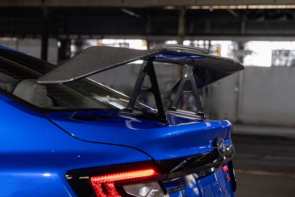Official Subaru photo of the dry carbon fiber STI swan-neck rear wing on the 2027 Subaru WRX GD25