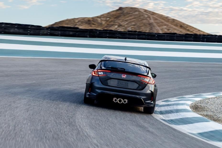 Official Honda photo of a Meteorite Gray 2027 Civic Type R rear three-quarter on a racetrack