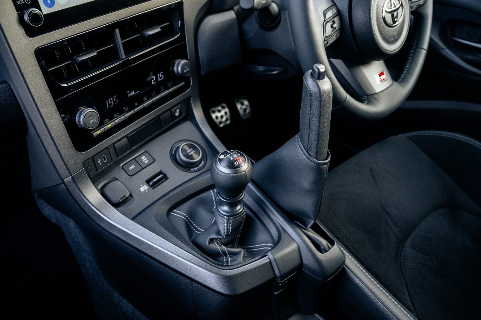 Six-speed manual gear lever and vertical handbrake in the 2026 Toyota GR Yaris Aero Performance. Image courtesy of Toyota (GB).